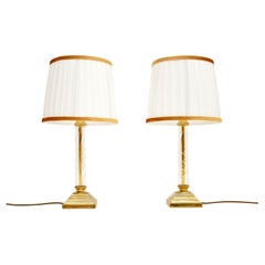 Pareja de lámparas de sobremesa vintage de latón y cristal