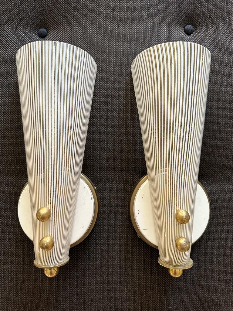 Vintage pair of brass wall lights with striped glass shade. Imperfections consistent with age and use. Hard wire ready.
