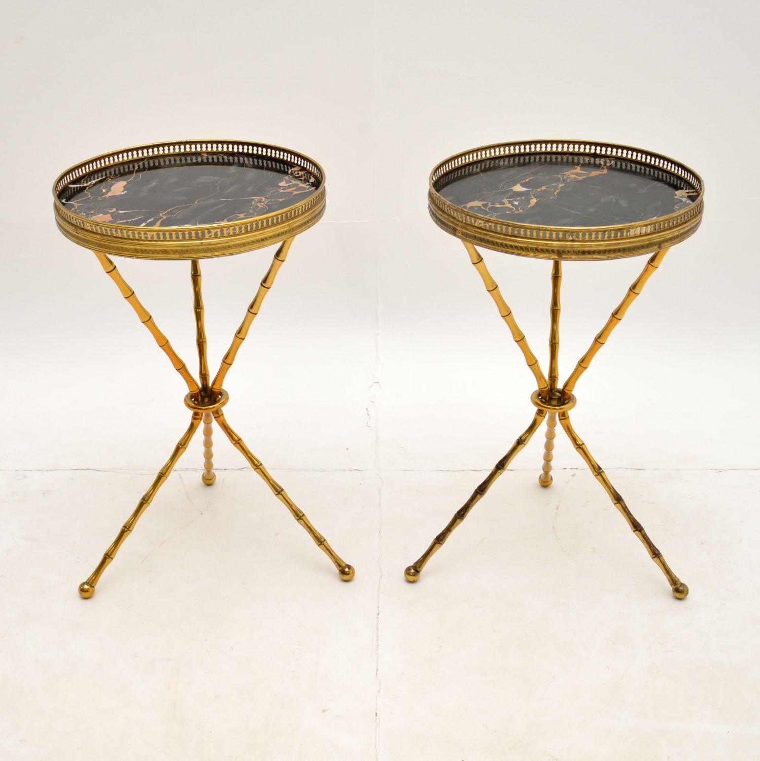 A stunning pair of vintage solid brass and marble side tables. Made in France, these date from around the 1950-60’s.

They are of superb quality, the brass tripod frames are designed as faux bamboo. They have pierced galleries around the top, and