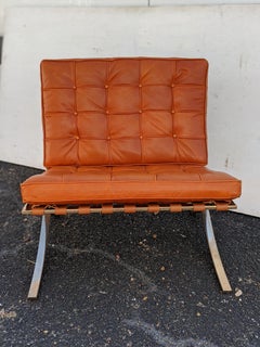 Pair of Vintage Brass Barcelona Chairs designed by Mies van der Rohe for Knoll