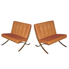 Pair of Vintage Brass Barcelona Chairs designed by Mies van der Rohe for Knoll