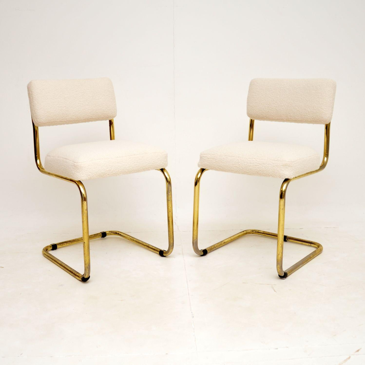 A stunning and very comfortable pair of vintage cantilever dining chairs with brass frames. They were likely made in Italy, and they date from the 1970’s.

They are very well made, sturdy and supportive. The brass frames have some surface wear and