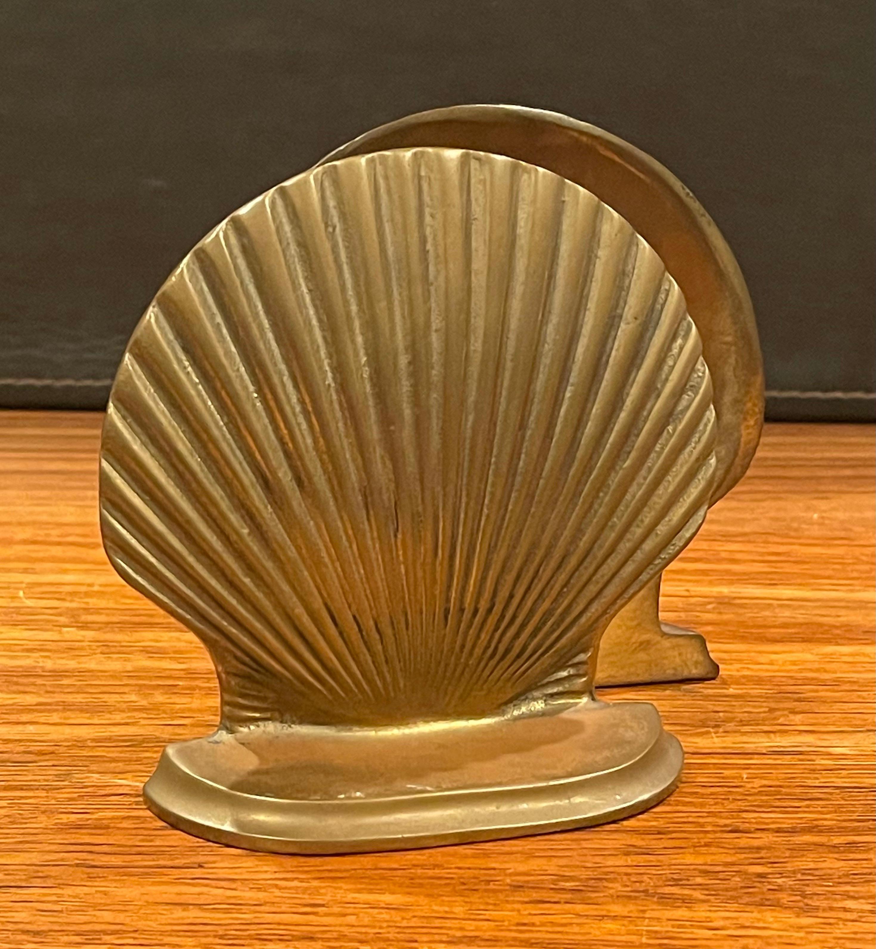 Pair of vintage brass clam shell bookends, circa 1970s. #1439.
