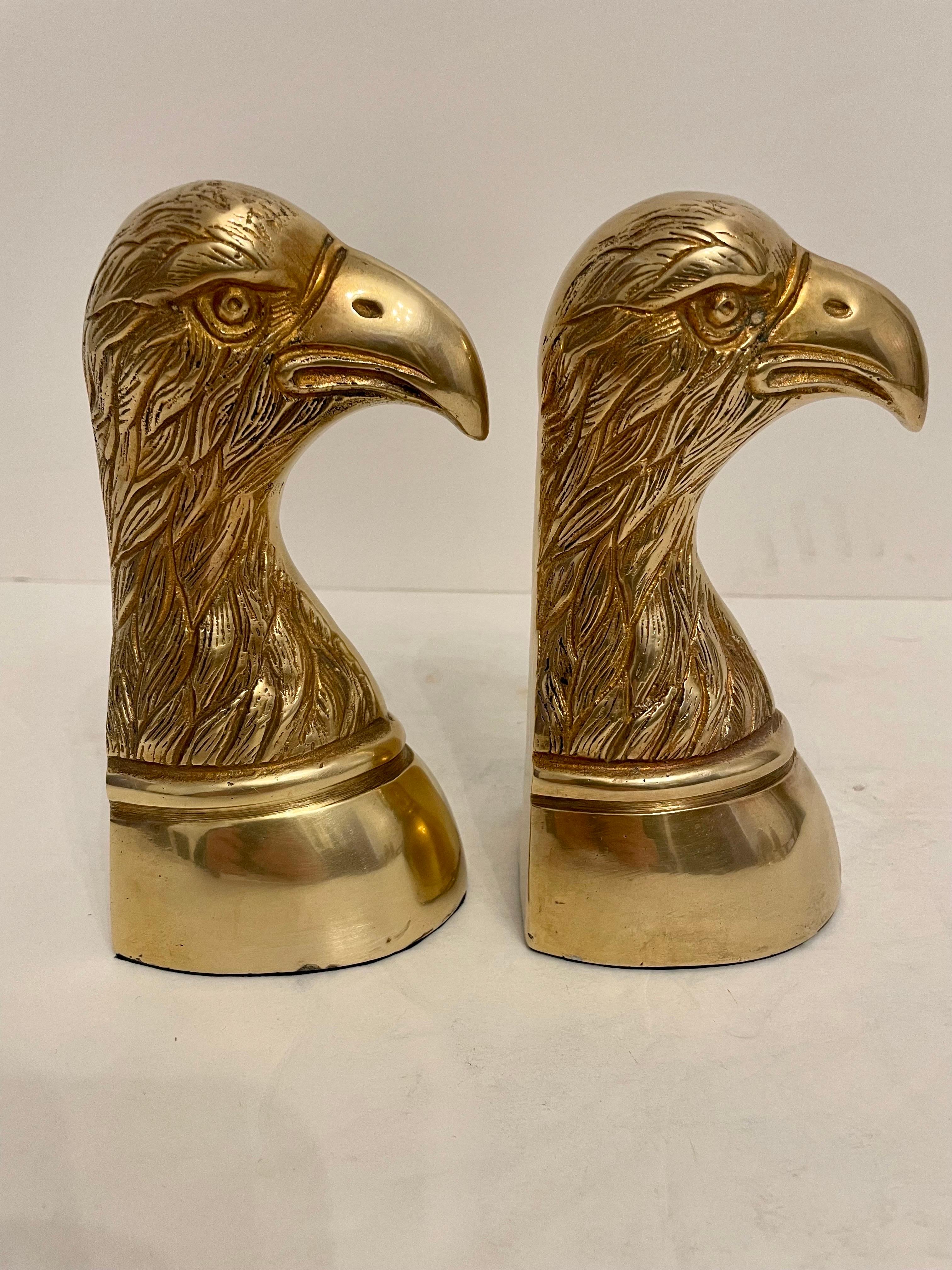 Nice set of heavy brass Eagle bookends. Can hold large stack of books.  Has thin felt on bottom of each to prevent scratching furniture. Great on a book shelf or desk. Nice condition, ready to use. Measures: 6.5” tall 3” deep x 3” wide. Ships same