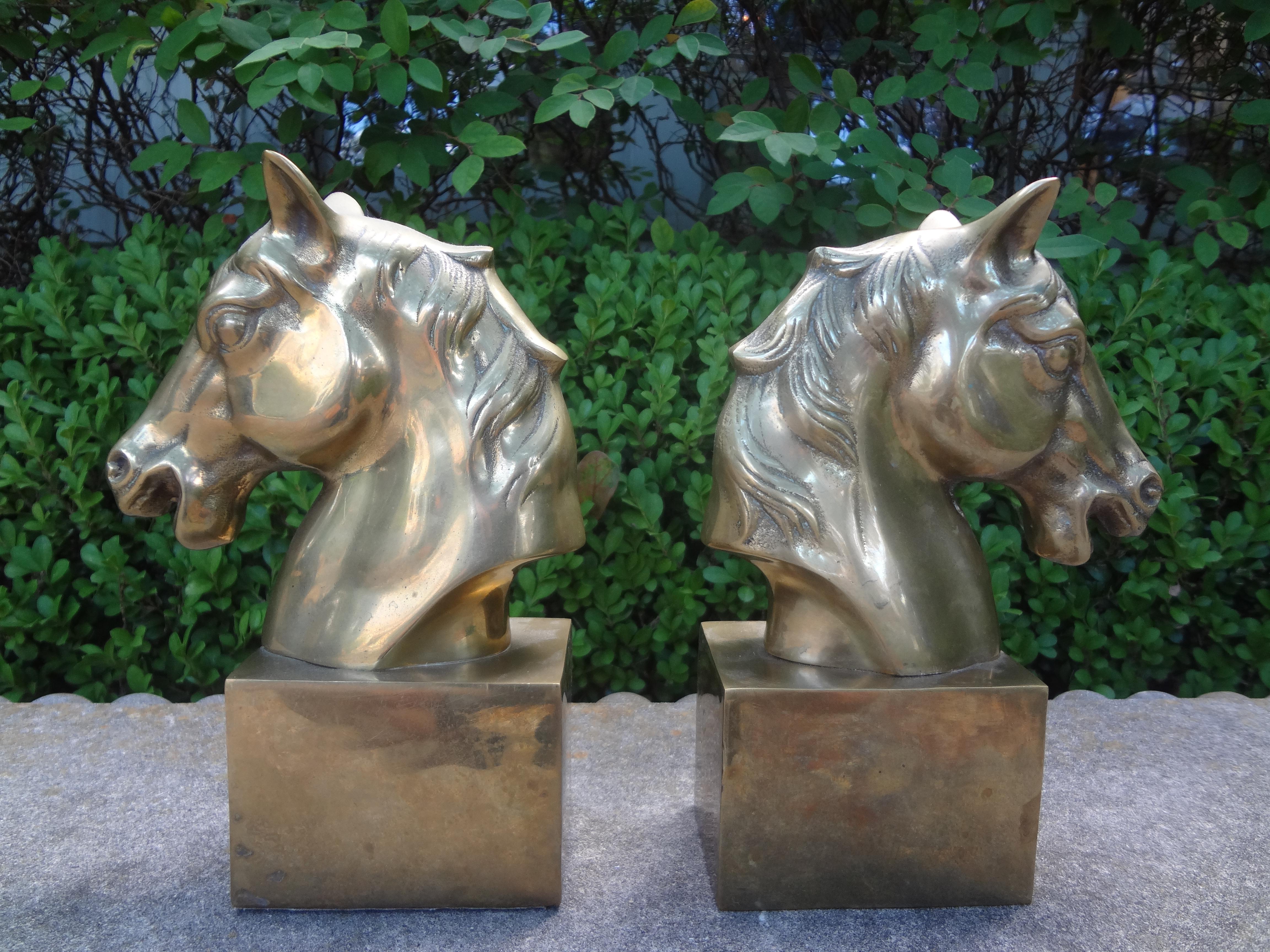 Pair of vintage brass horse head bookends. These hollywood regency brass horse head bookends will make the perfect addition to your bookcase or coffee table.