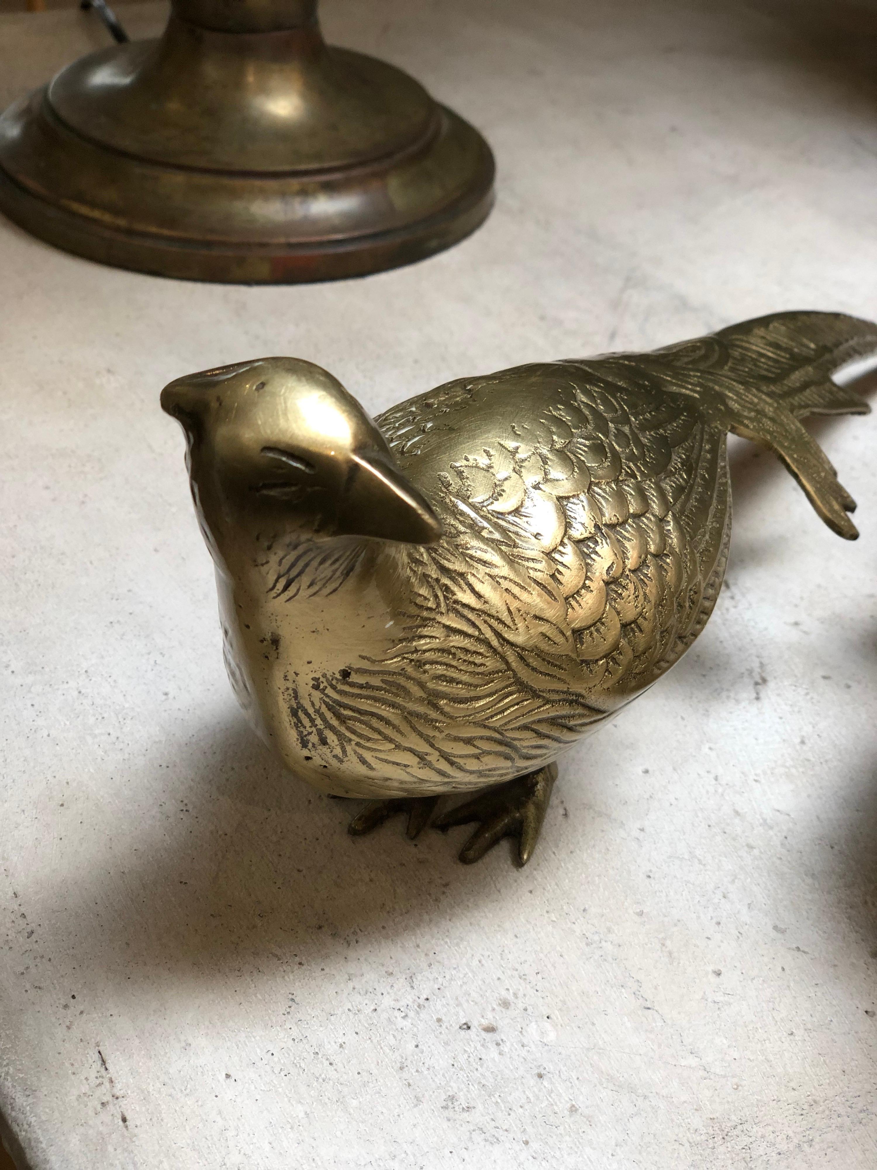 Pair of brass vintage male and female birds. See images for condition.