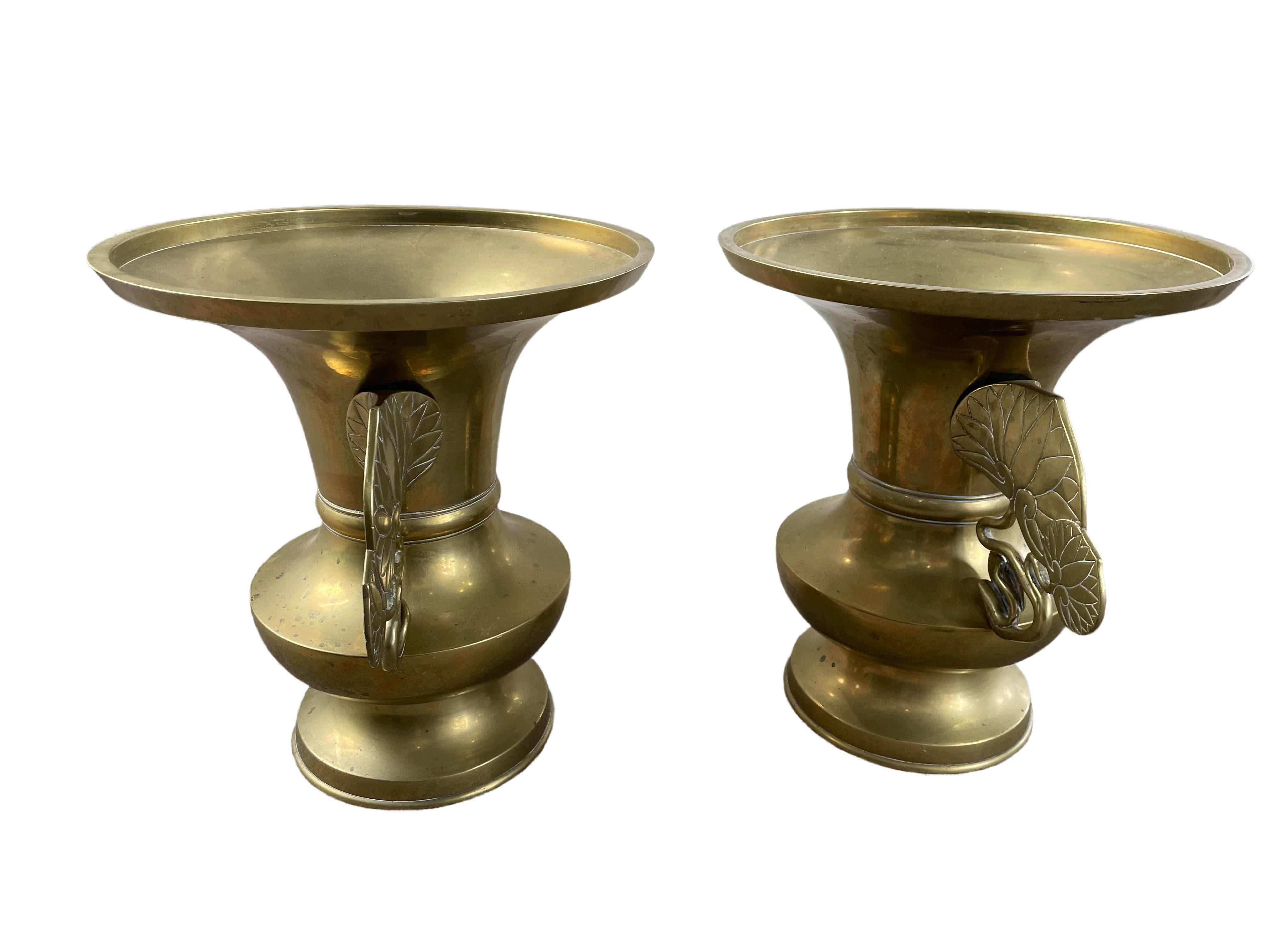 Exquisite brass vases with removable hand-forged handles in an intricate leaf design, A blend of elegance and nature's beauty