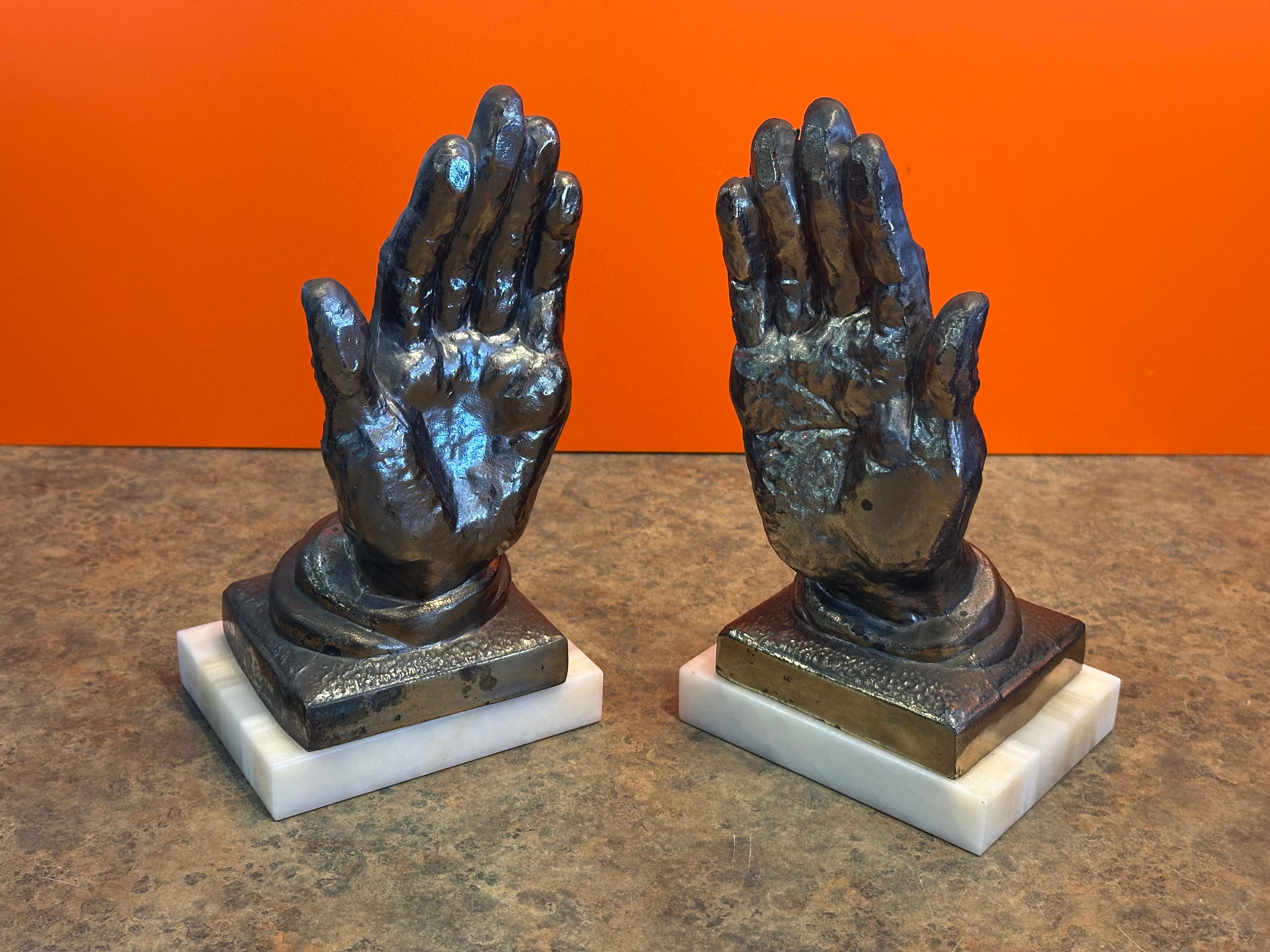 Coppia di reggilibri d'epoca in ottone 