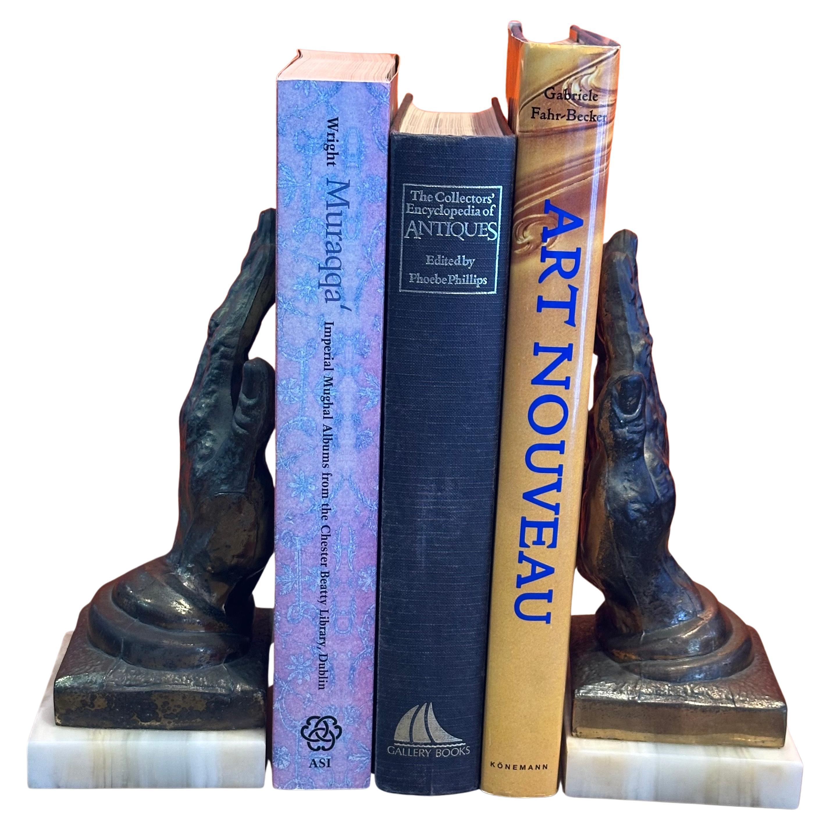 Coppia di reggilibri d'epoca in ottone 