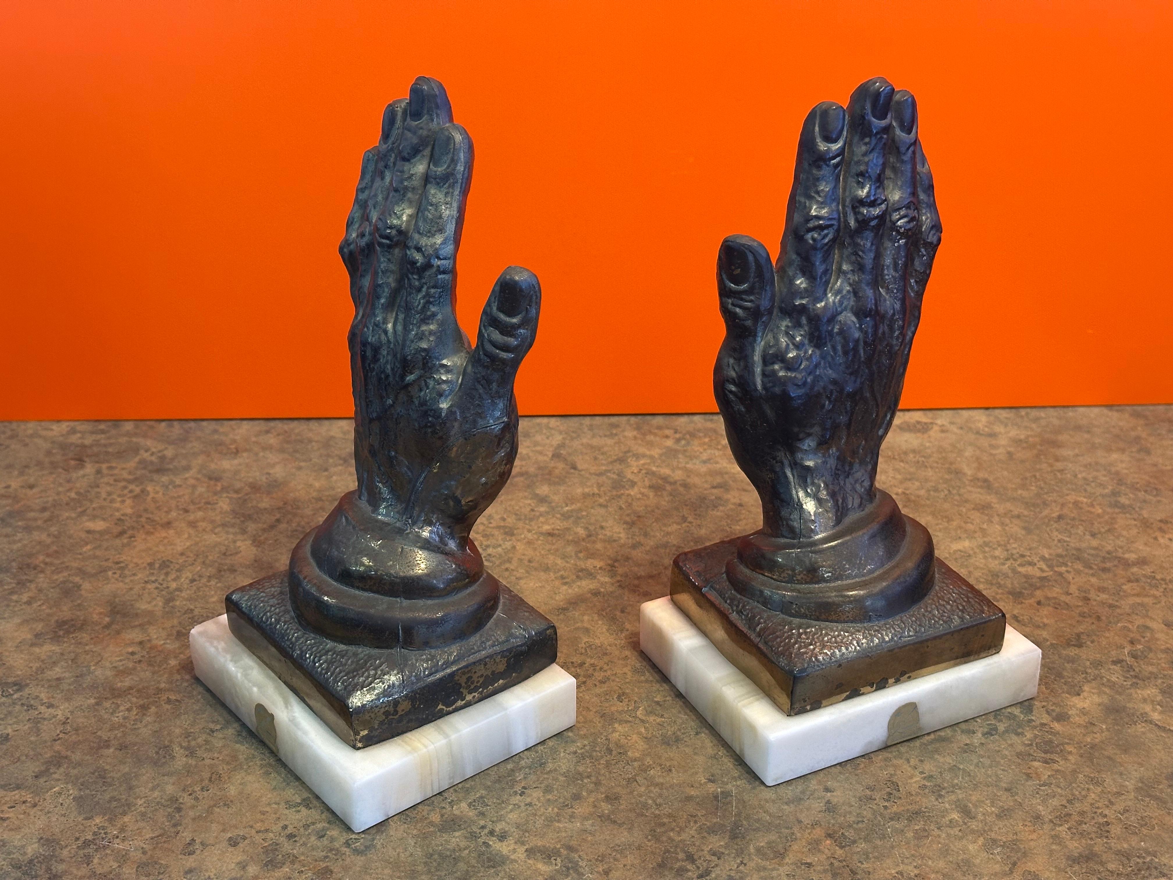 Coppia di reggilibri d'epoca in ottone 