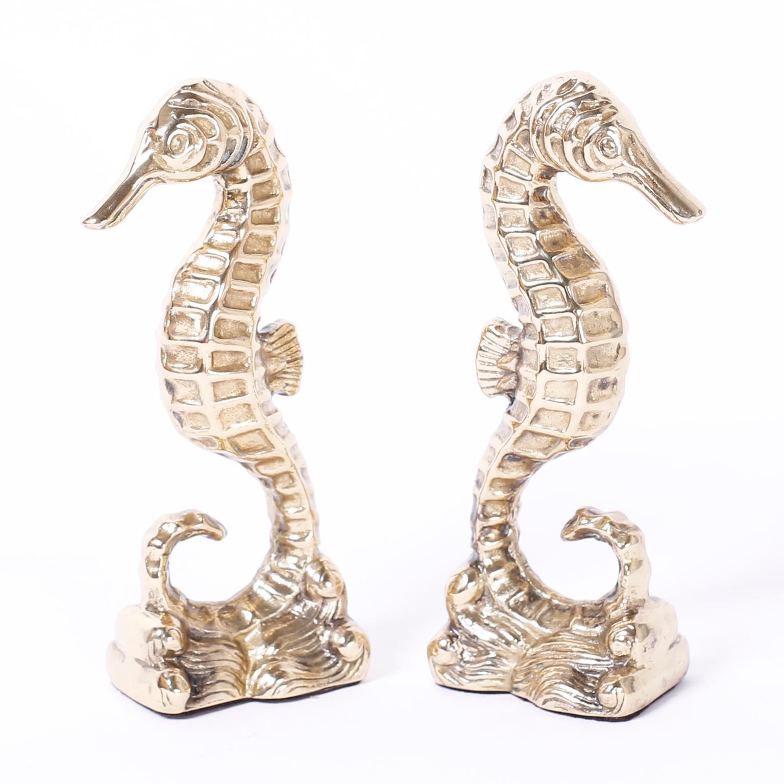 Pair of cast brass seahorse bookends or objects of art with their enigmatic charm, hand polished and lacquered for easy care.