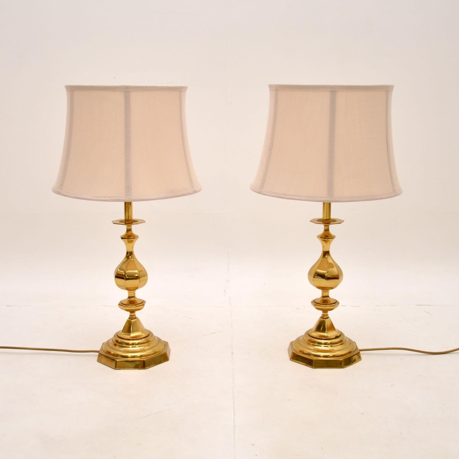 A large and impressive pair of vintage brass table lamps. They were made in England, they date from around the 1970’s.

They are very stylish and are a substantial size. The quality is fantastic, they are solid brass and have a gorgeous design.

We