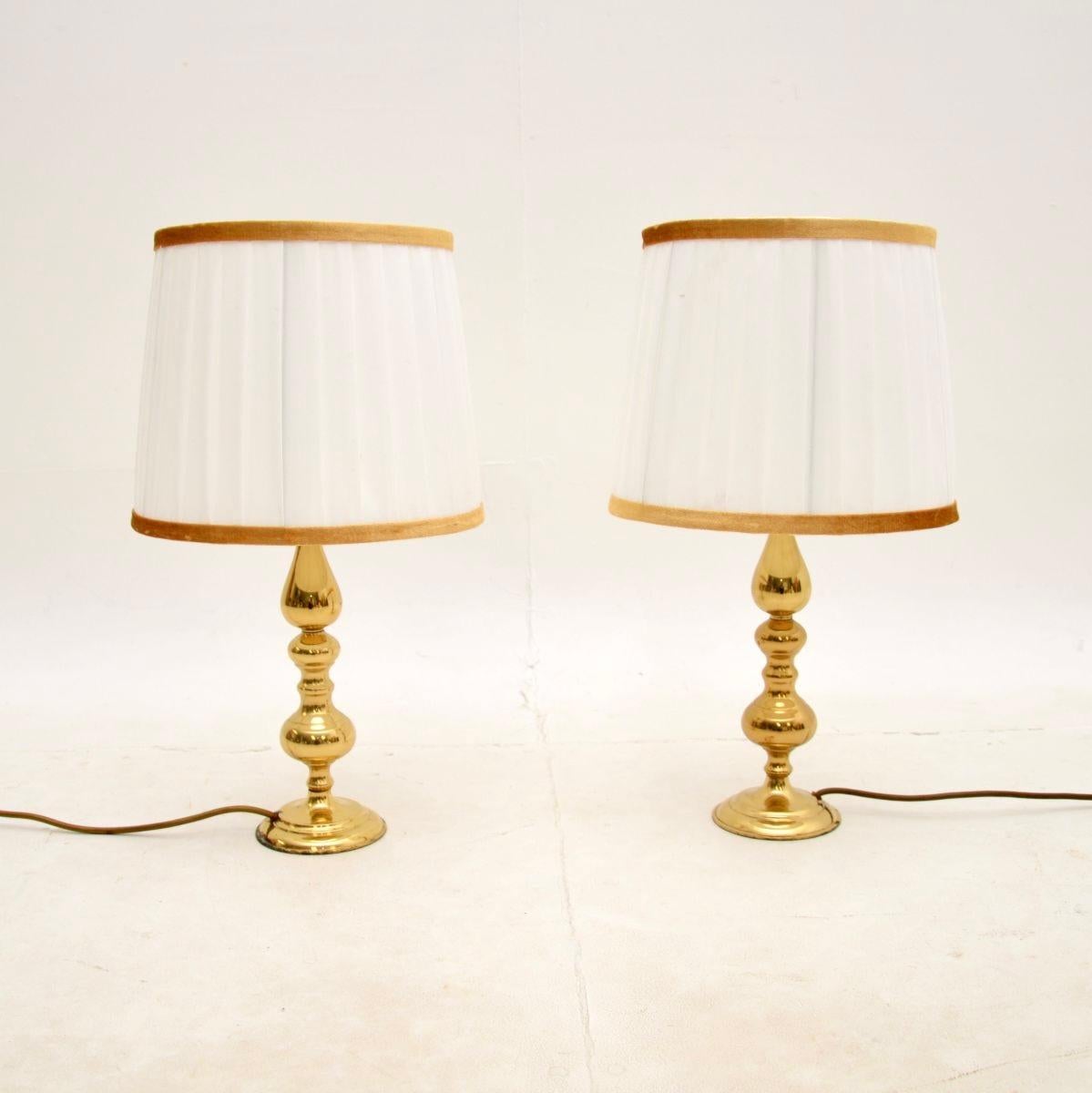 A lovely and very well made pair of vintage brass table lamps. They were made in England, they date from around the 1970’s.

The quality is excellent, they have a beautiful design and are a nice petite size, perfect for bedside lamps or use in a