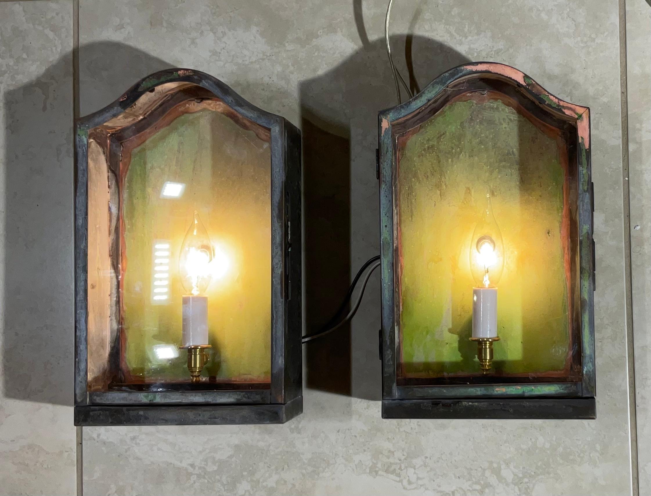 Elegant pair of vintage wall lantern, hand crafted from solid brass with one 60/watt light each. Suitable for wet location.
This pair of lantern was originally from estate in Miami Beach, professionally restored and newly electrified. One 60/watt