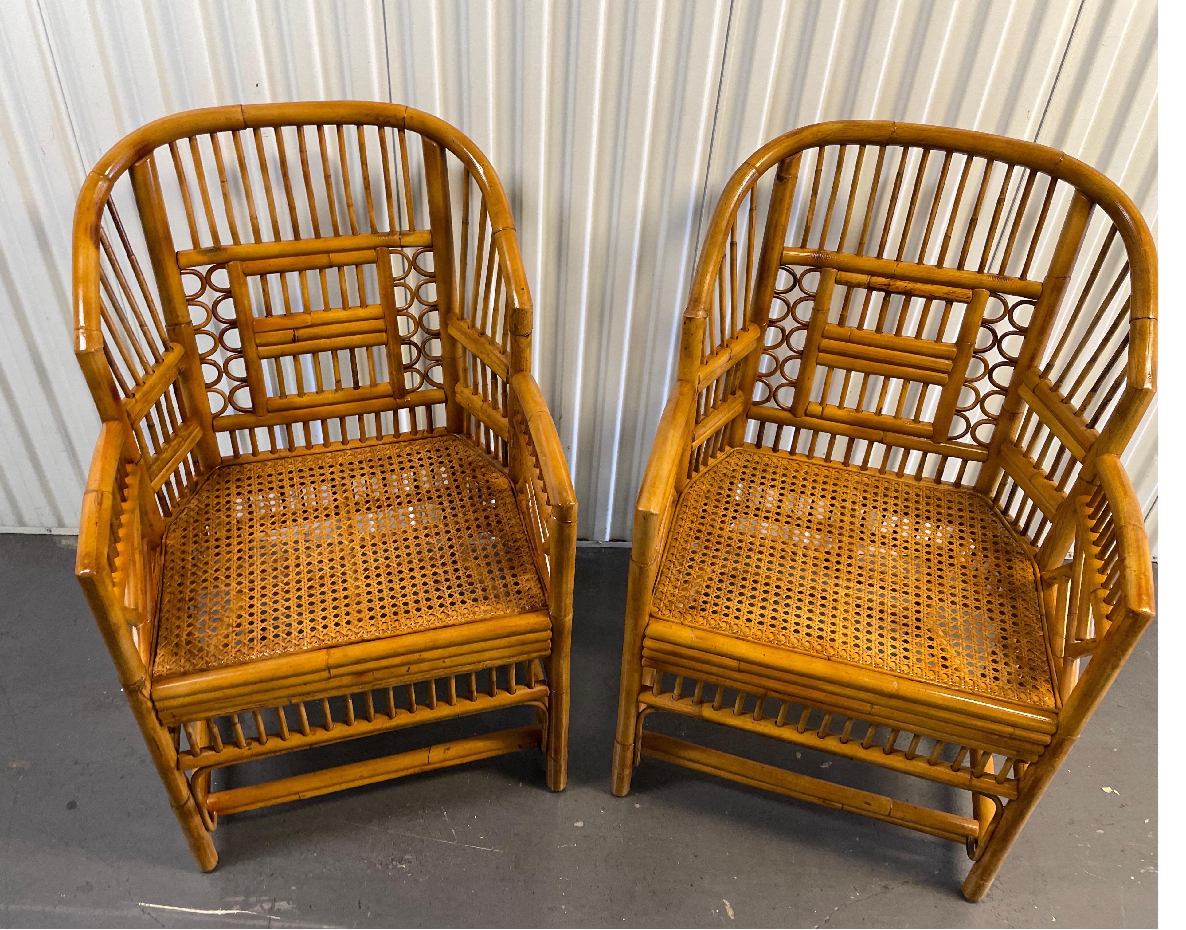 Pair of vintage bamboo & rattan brighton pavilion armchairs with cane seats.