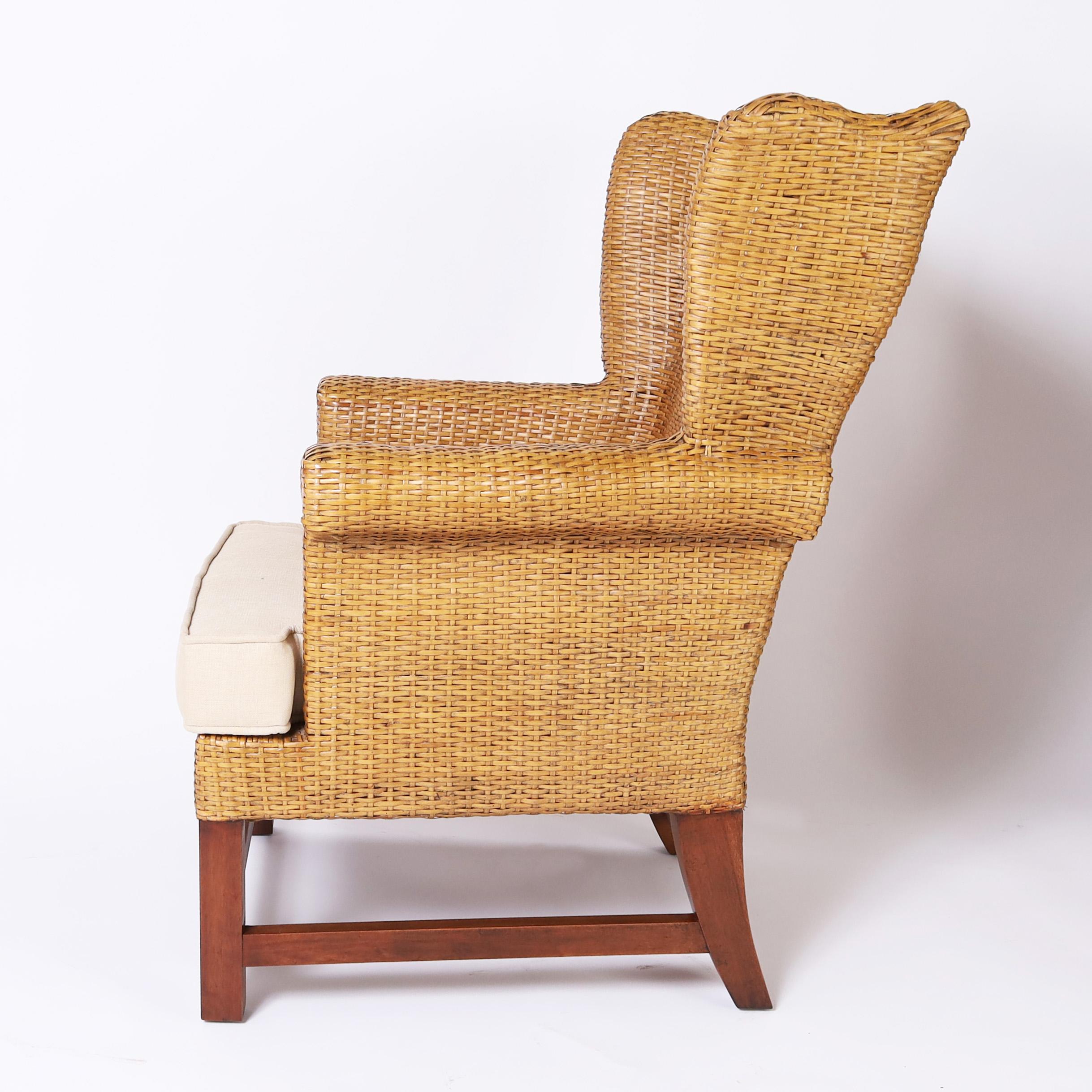 Hand-Woven Pair of Vintage British Colonial Style Woven Reed Wingback Armchairs For Sale