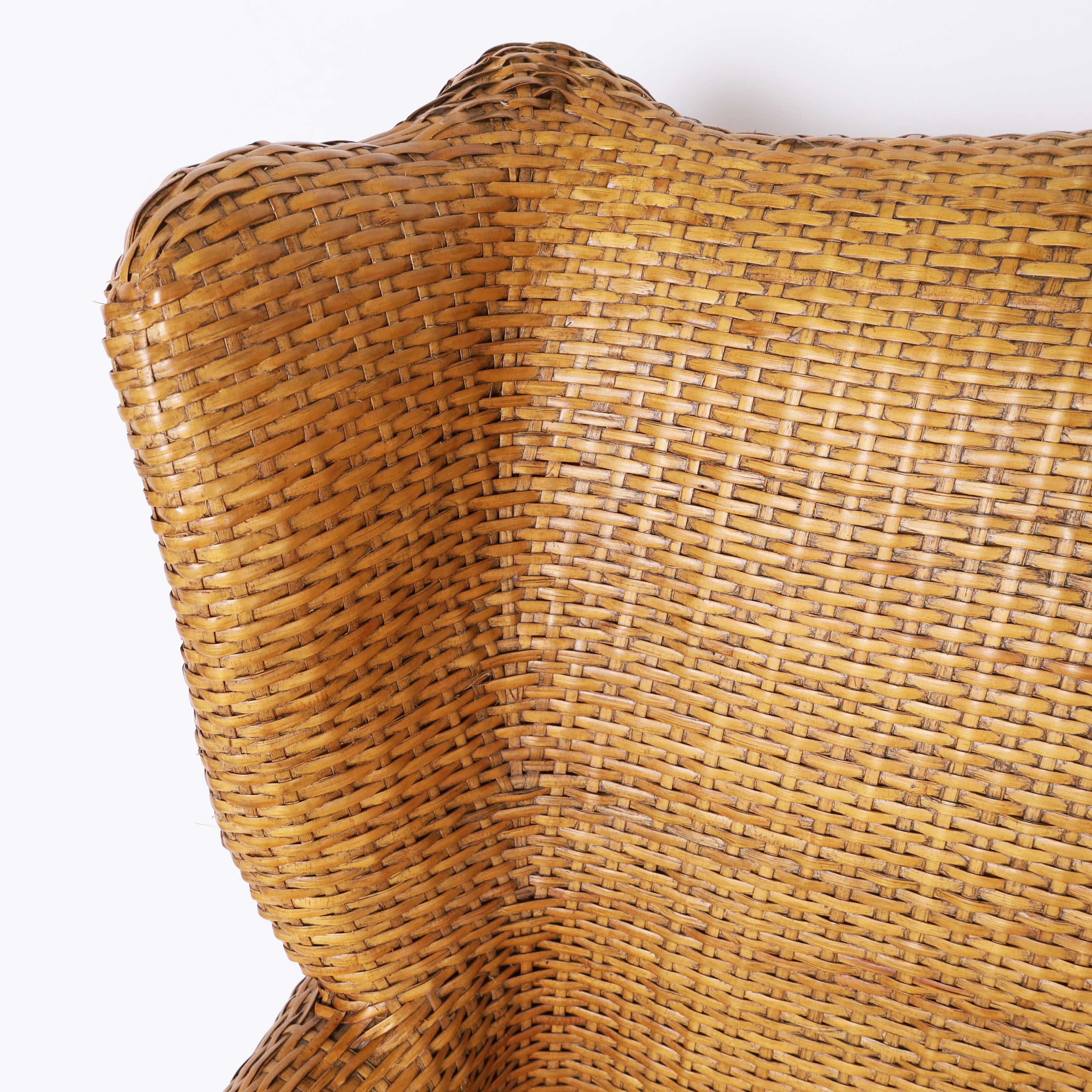 Wicker Pair of Vintage British Colonial Style Woven Reed Wingback Armchairs For Sale