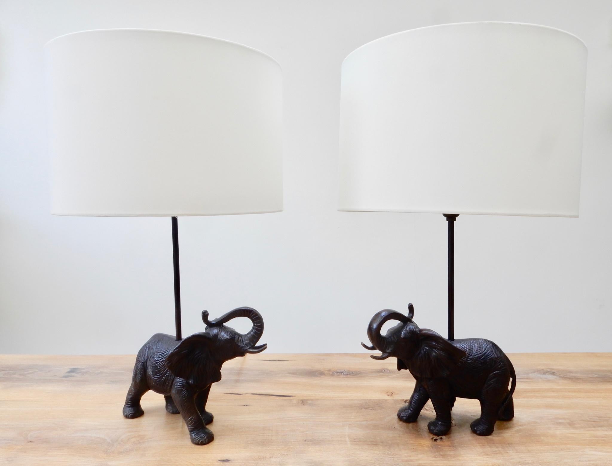 Pair of late 20th century bronze black patina elephant lamps, Vietnam.