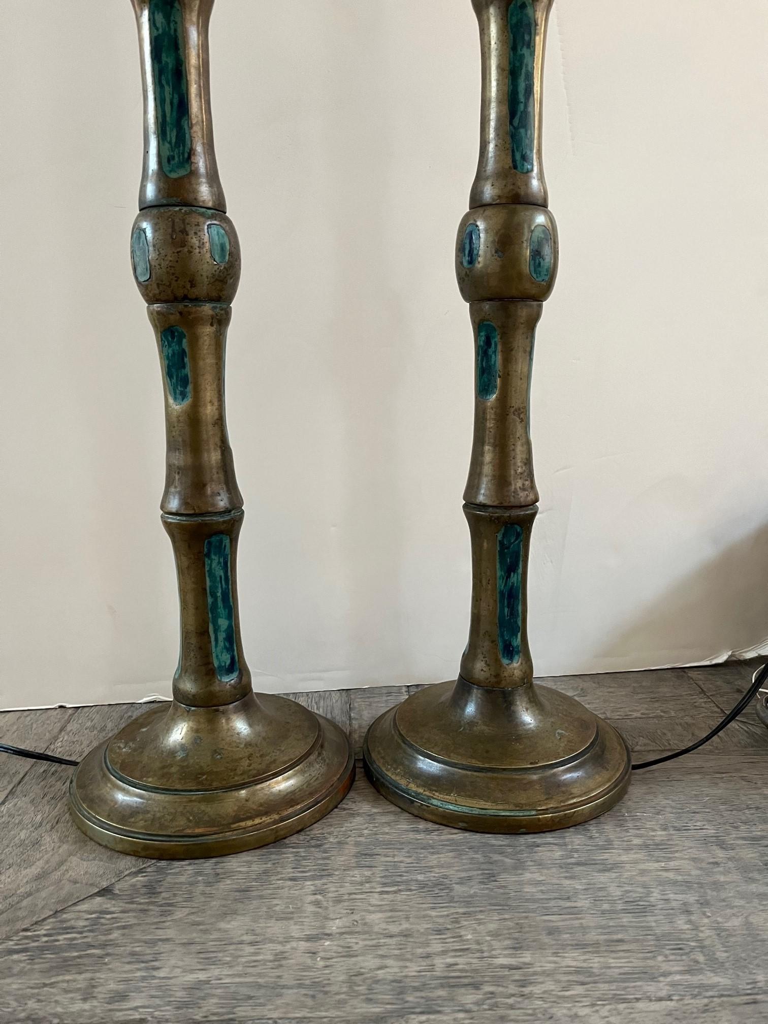 Pair of vintage bronze table lamps designed by Pepe Mendoza, designed with Faux Bamboo Stalk Motif in bronze, inlaid with enameled Turquoise Ceramic, Includes two matching silk shades,
In style Mid-Century Modern, on circular bases marking include