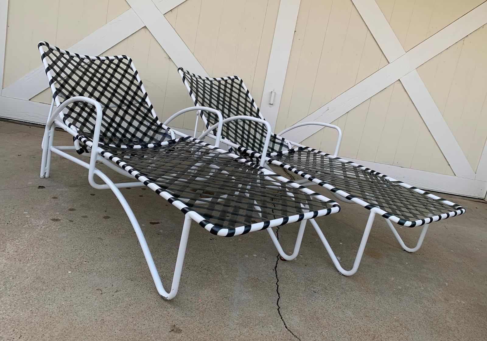 Rare Brown Jordan Lido chaise lounge chairs in white with greenish vinyl strapping.
In good vintage condition. Straps are solid and complete with some sun fade/oxidation. Frame shows some scratches and finish wear consistent with age and