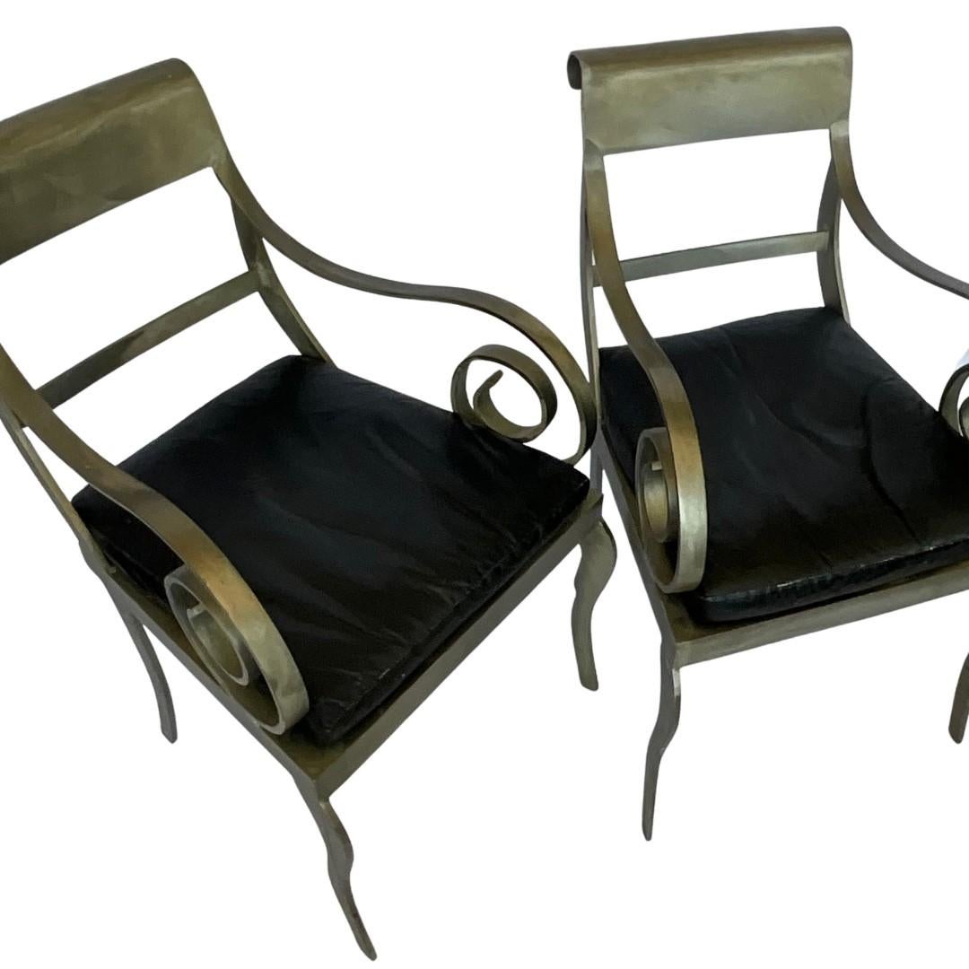 Pair of Vintage Metal Chairs

Brushed Solid Steel

Removeable Vintage Black Leather Cushions

Solid Steel Seat

Swirl Design Accent

Approximately 50 LBS Each

Origin Unknown

     Height: 33.25