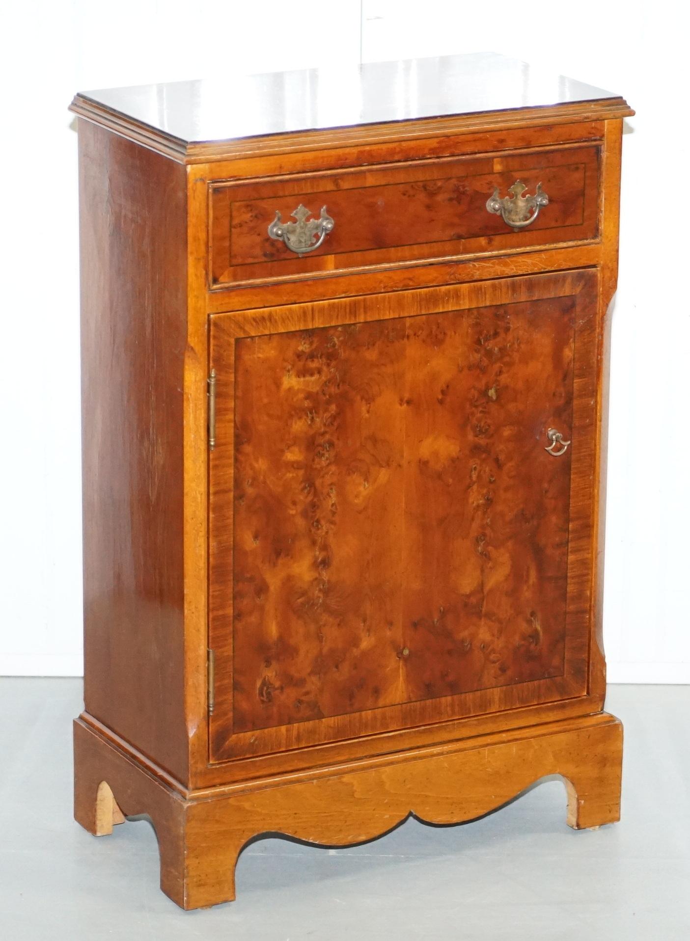 We are delighted to offer for sale this stunning pair of lovely vintage Burr Yew wood lamp end wine side table cupboards each with a single drawer and shelf.

A good looking and well-made pair, ideally suited in a living room next to seating to