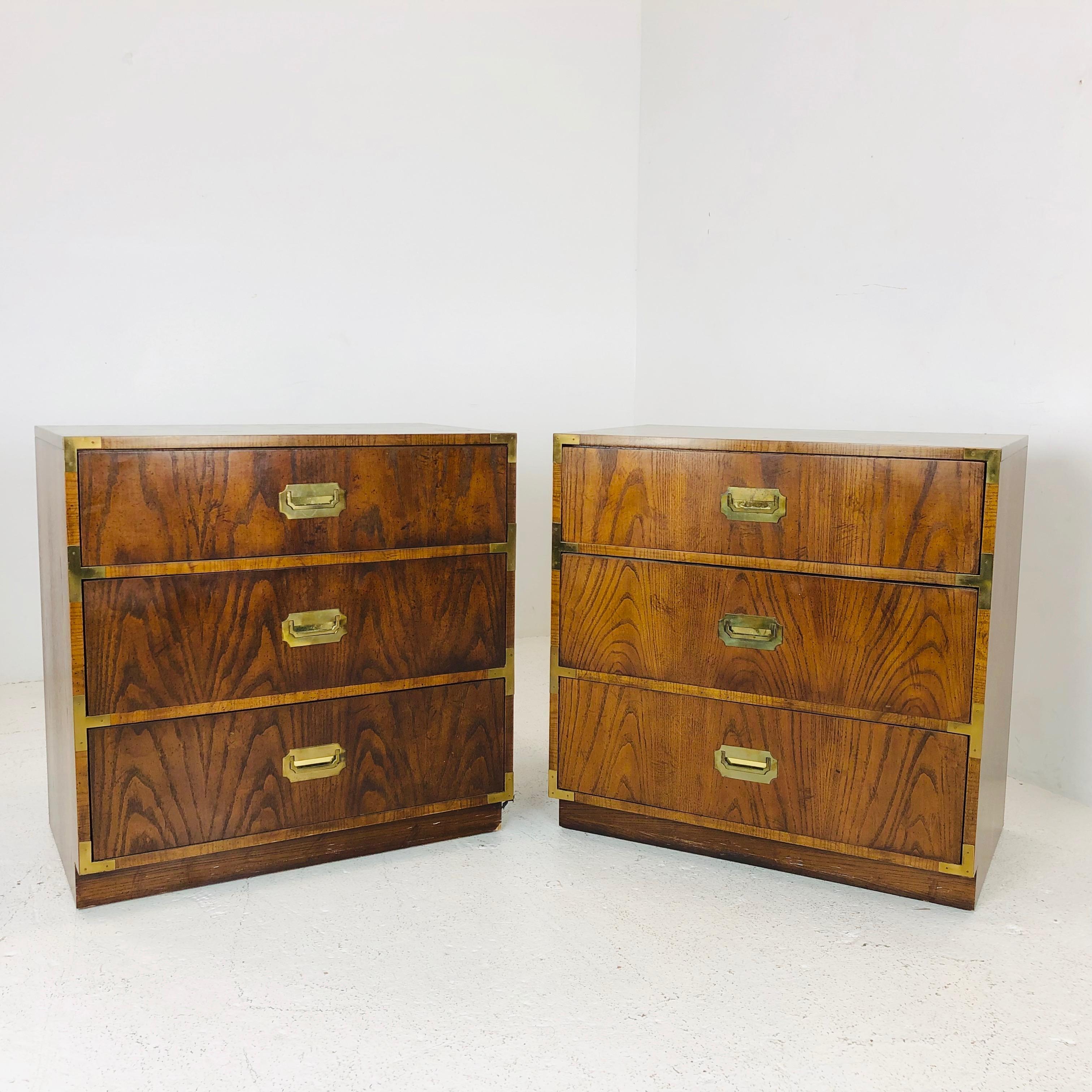 Pair of vintage campaigner chests by Dixie. These chest are in good vintage condition and will need refinishing.


Dimensions:
30 W x 18.5 D x 30 T.