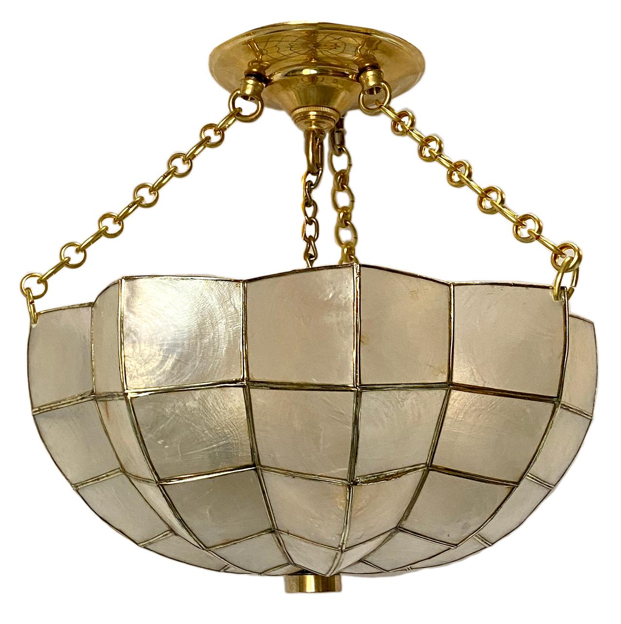 1940s French pendant capiz light fixture with three interior candelabra lights.

Measurements:
Diameter 13.5