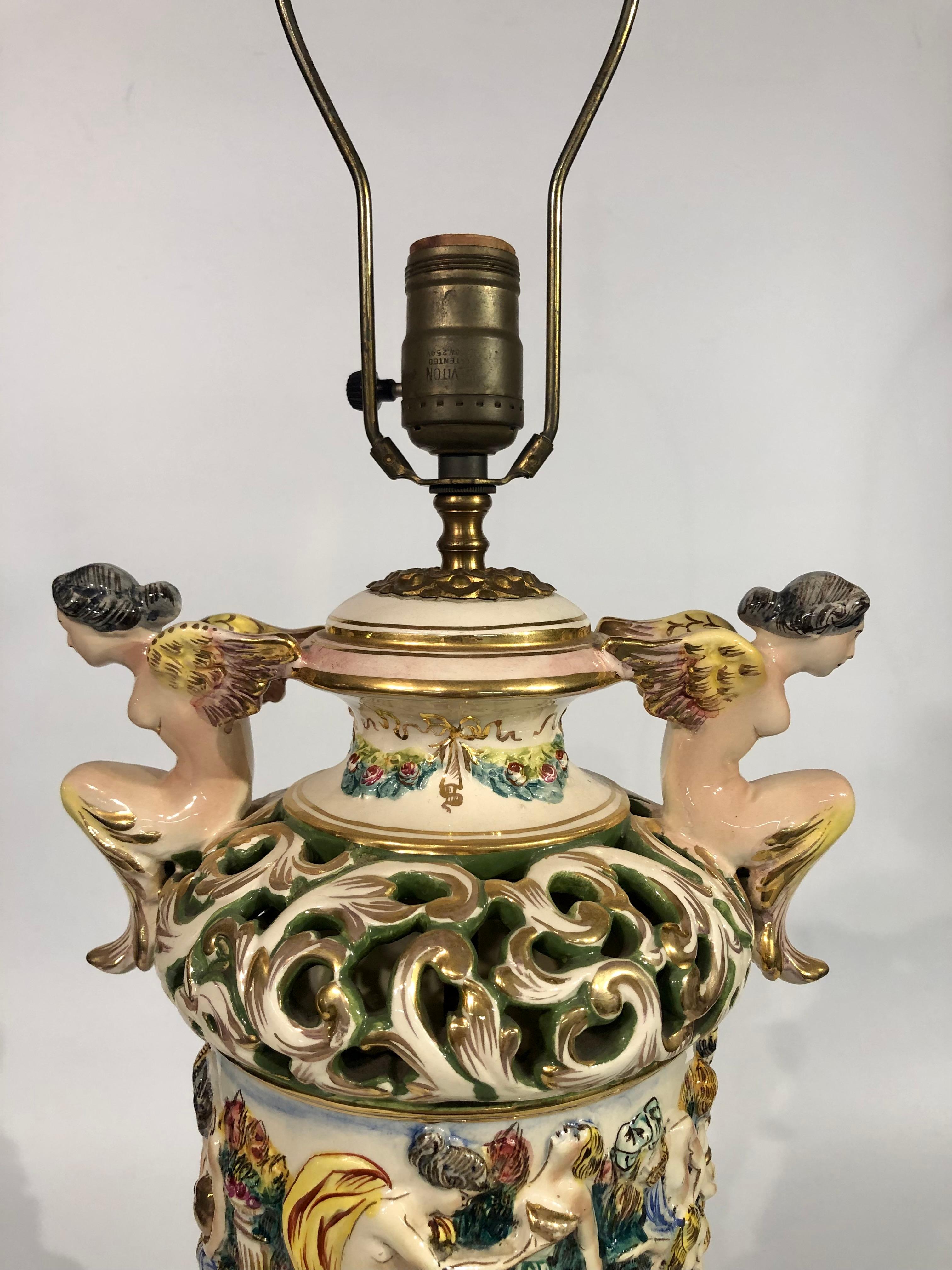 Ceramic Pair of Vintage Capodimonte ceramic lamps with figurative bacchanal scene For Sale