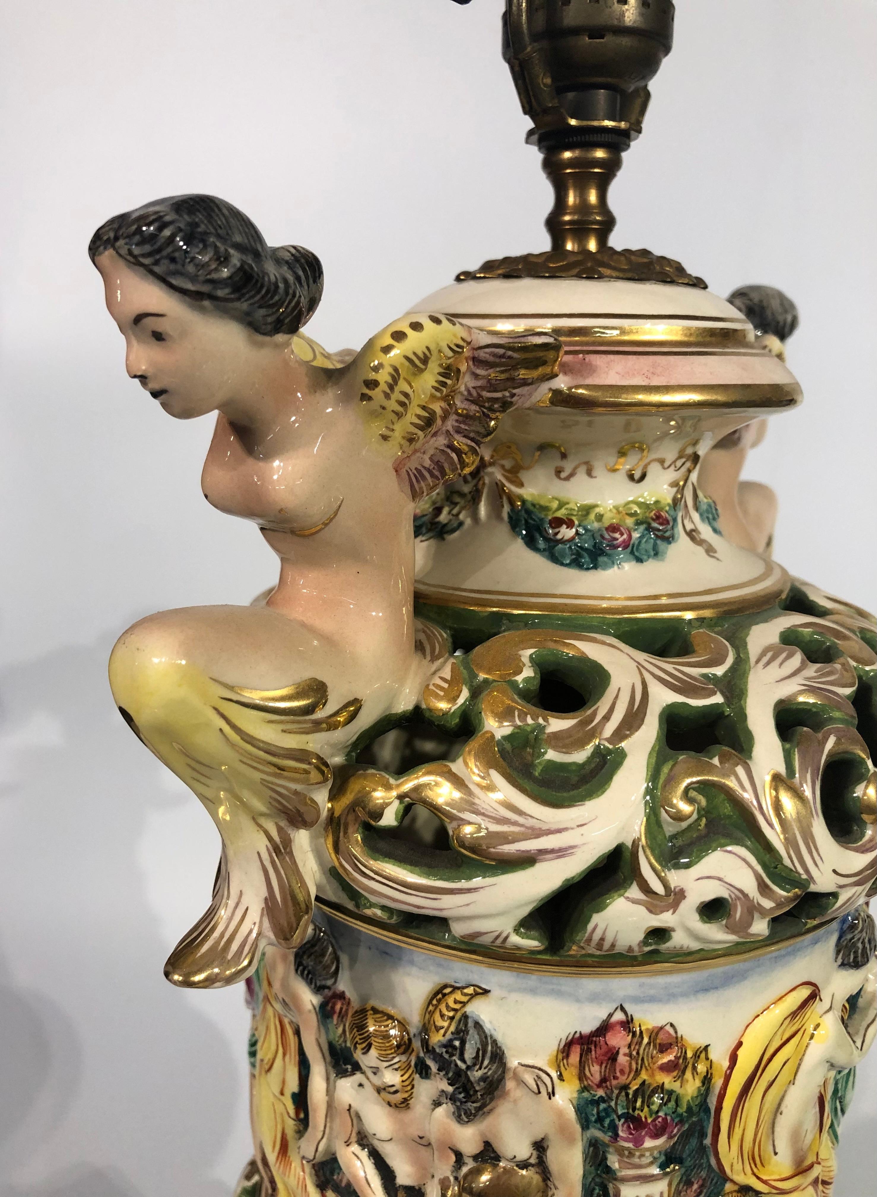 Pair of Vintage Capodimonte ceramic lamps with figurative bacchanal scene For Sale 1