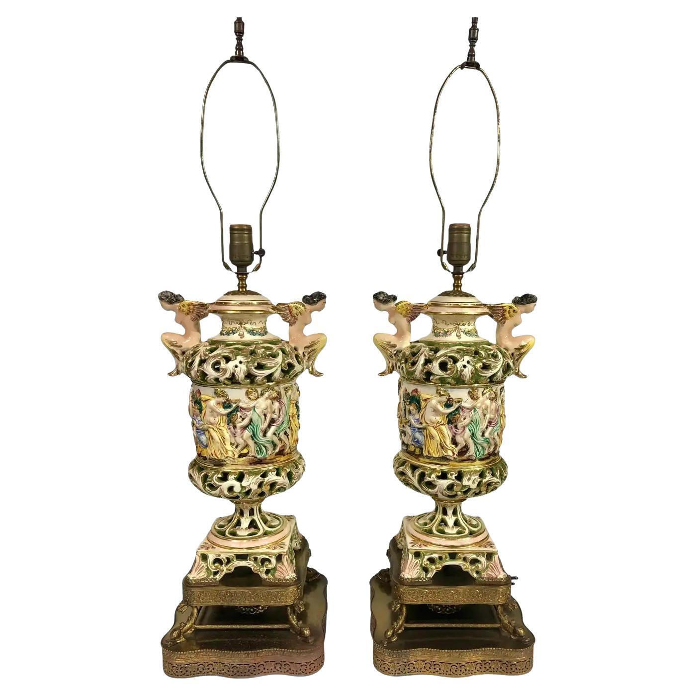 Pair of Vintage Capodimonte Figurative Ceramic Lamps with Bacchanal Scene en vente