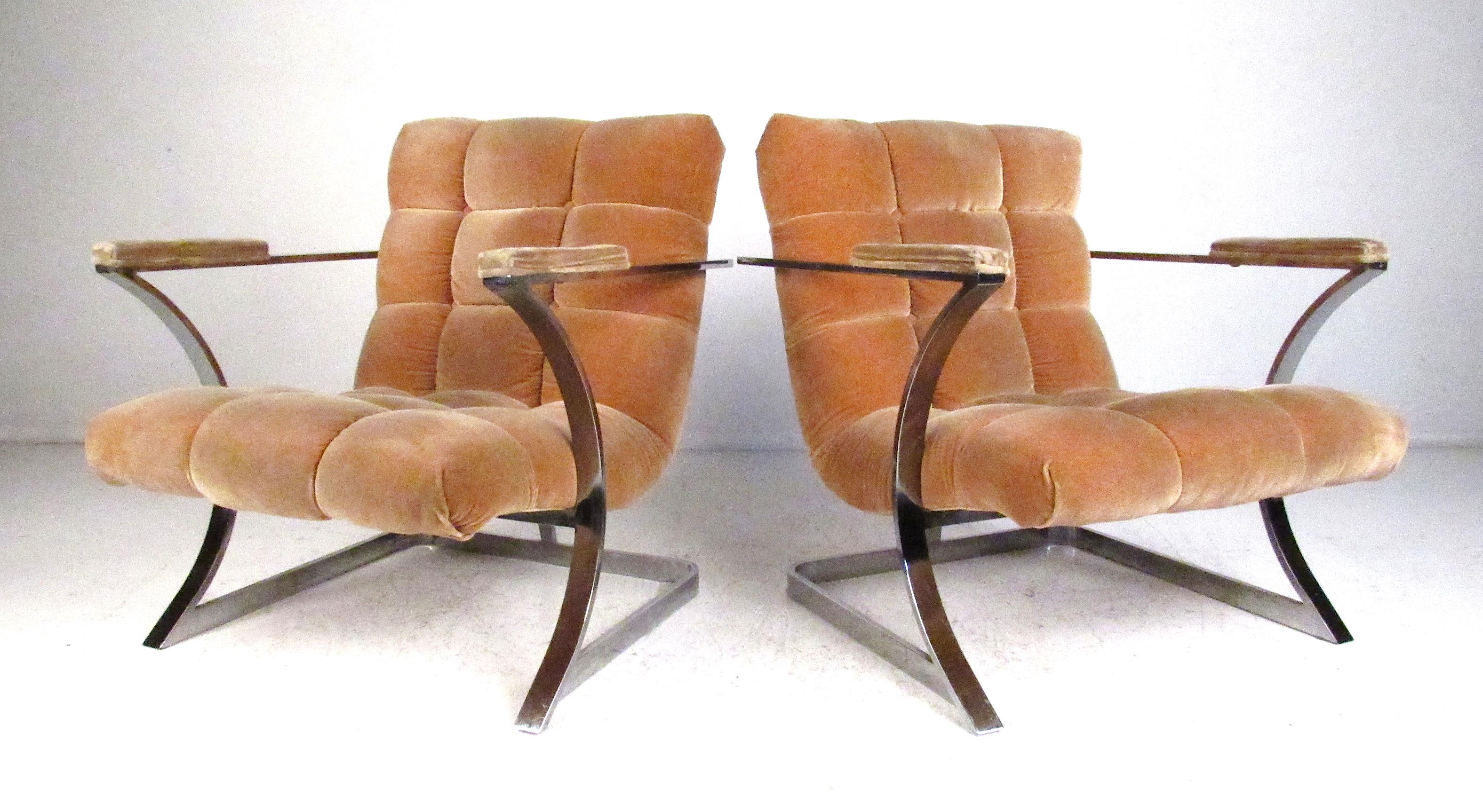 Pair of Mid-Century Modern floating sling chairs by Carsons, high point, North Carolina. Flat stock chrome frames support tufted upholstery creating classic midcentury styling with a modern aesthetic. Please confirm item location (NY or NJ) with