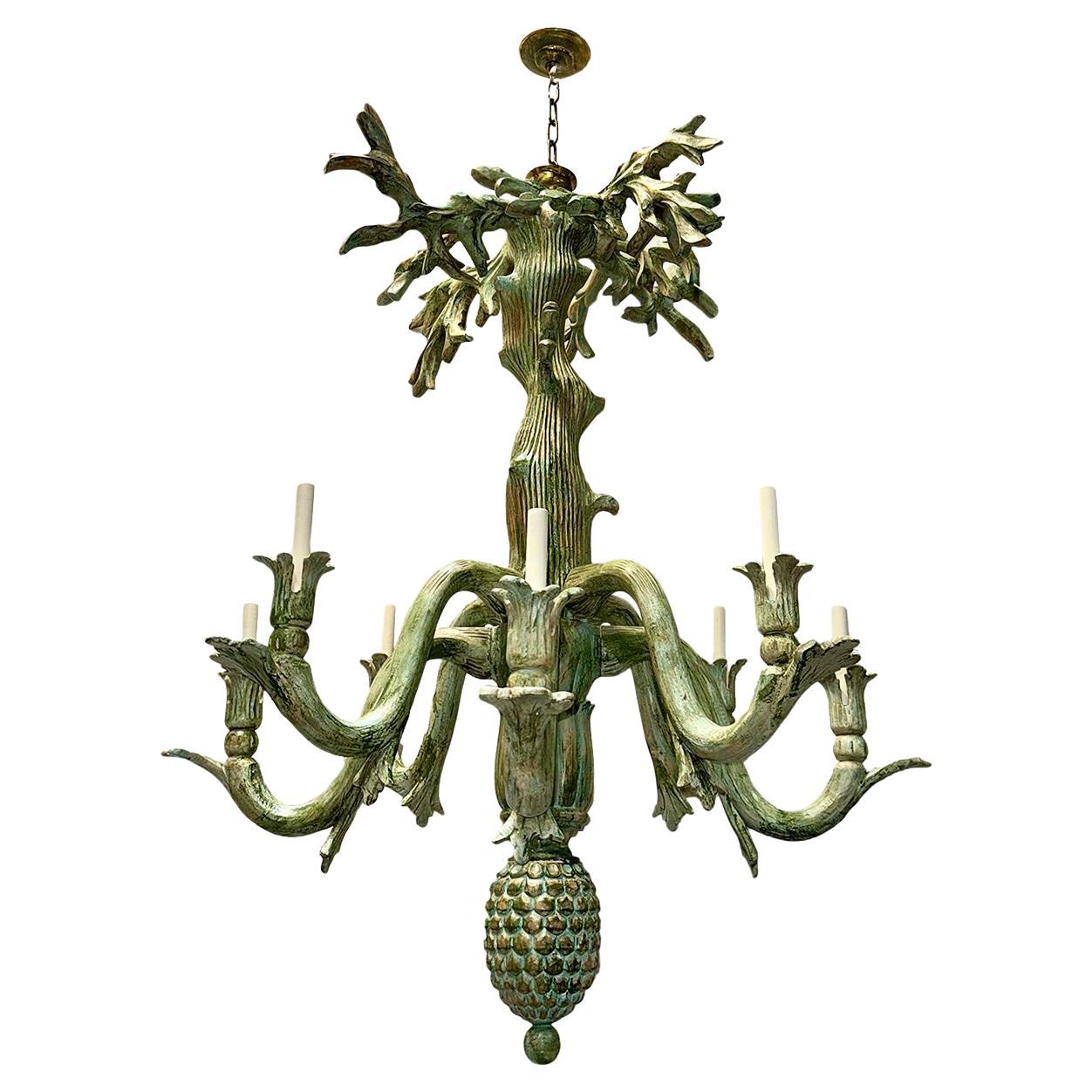 Paire de lustres vintage en bois sculpté, vendus individuellement en vente