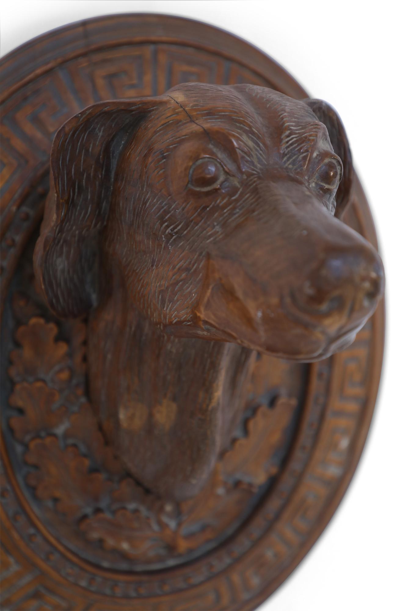 Pair of Vintage Carved Wooden Dog Head Wall Plaques In Good Condition In New York, NY