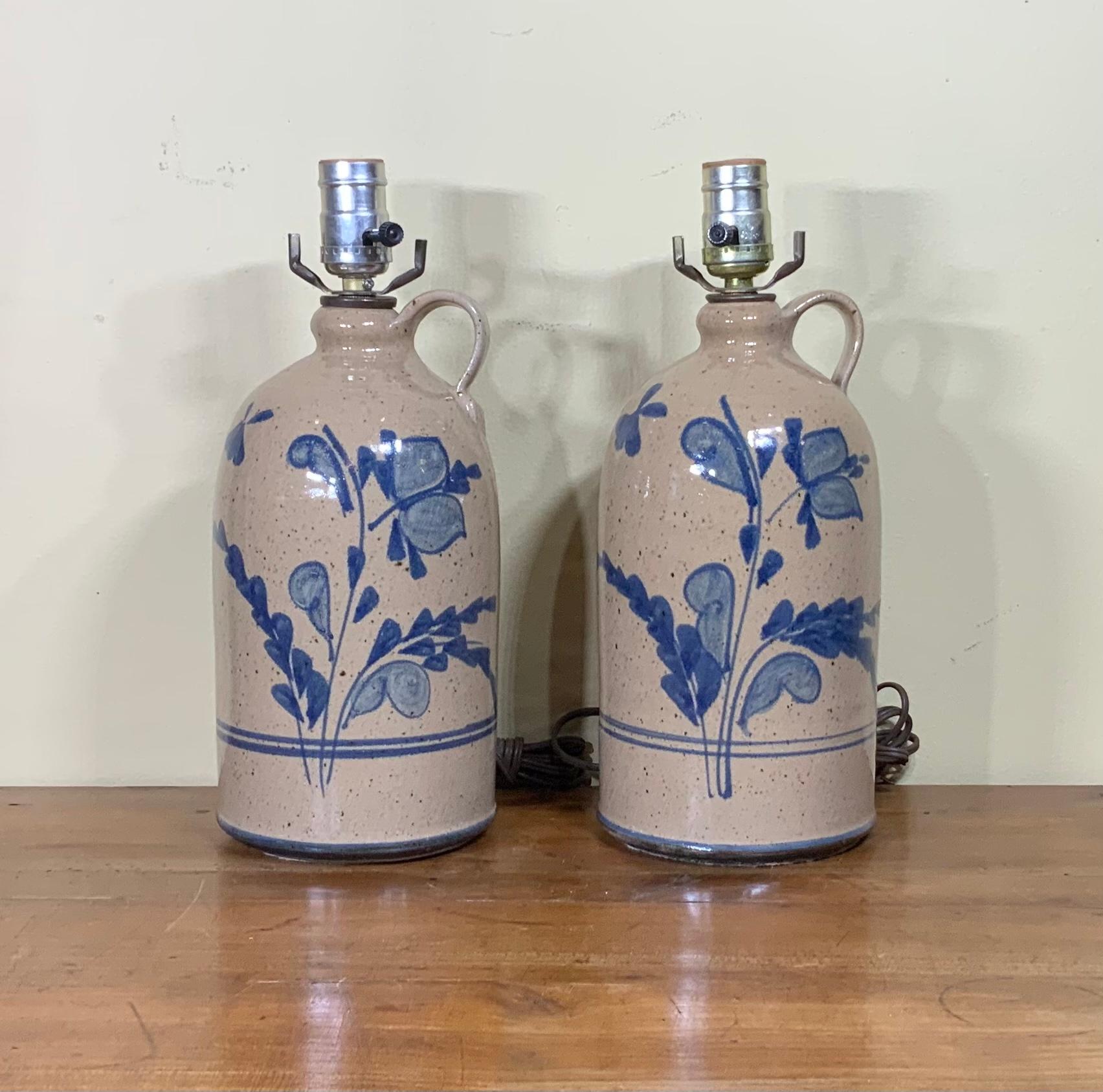 Pair of vintage ceramic bottle converted to table lamps, beautiful blue floral and butterfly motifs.
Size of bottle only : 5”.5 x 10”.5
  