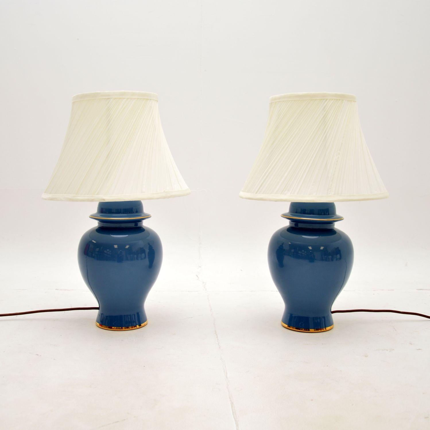 A stylish and very well made pair of vintage ceramic table lamps. They were made in England, they date from around the 1970’s.

The quality is superb, they are a lovely size and have a gorgeous light blue glaze, with gold trim.

The condition is