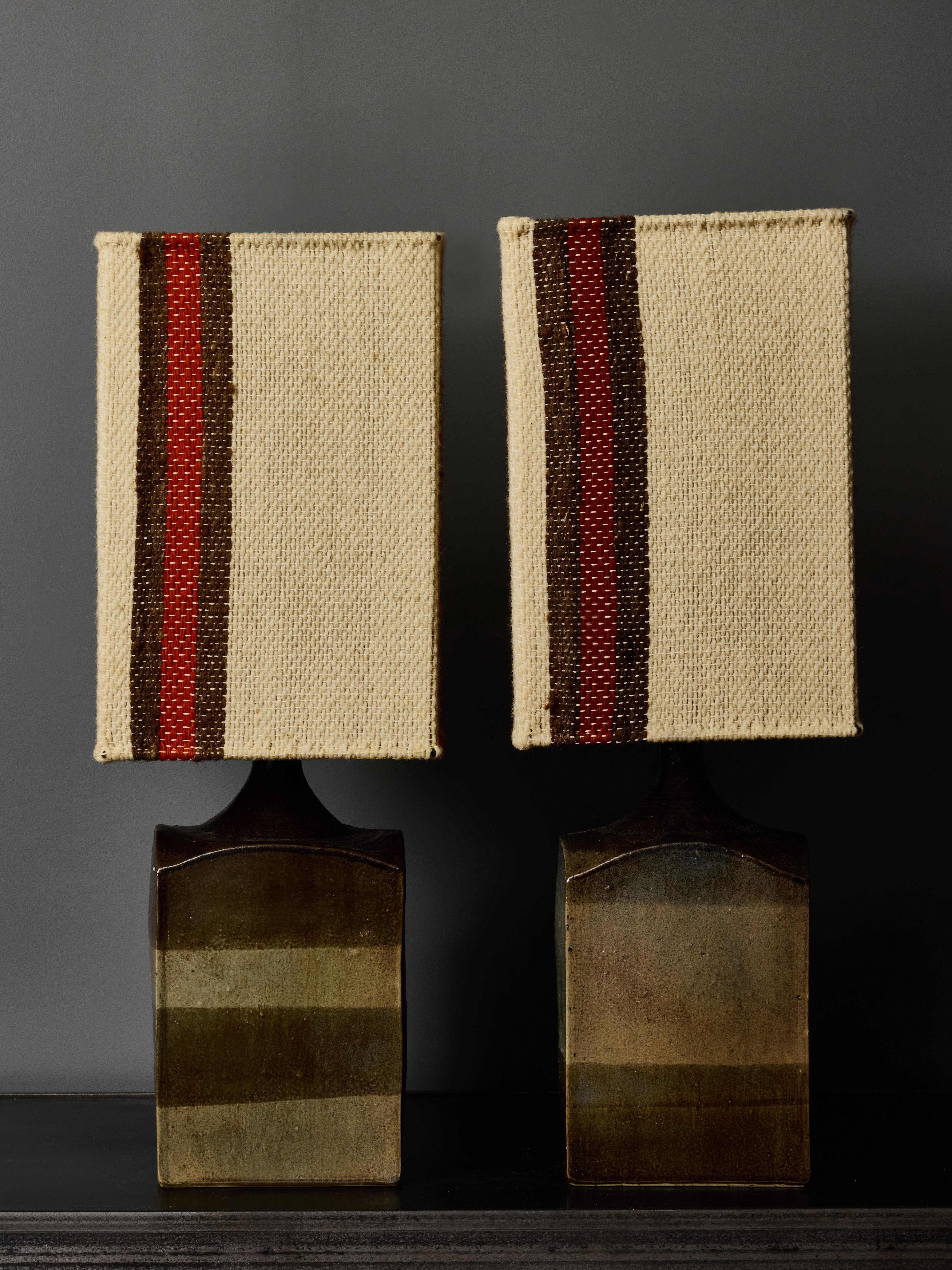 Pair of vintage ceramic table lamps by Atelier Tournesol from Tourrettes-sur-Loup, France. These lamps feature an identical square shape, showcasing their uniqueness through a variety of glaze colors applied in distinct patterns on each lamp.