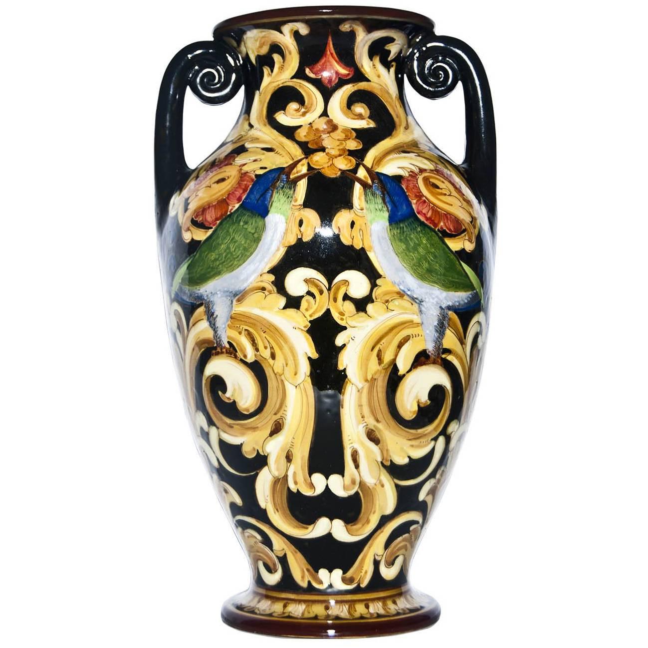 Pair of ceramic painted vases decorated with birds, grapes and floreal motif by Renato Bassanelli. 
Both signed and situated under the base: R. Bassanelli Roma.

Very good conditions.

This artwork is shipped from Italy. Under existing