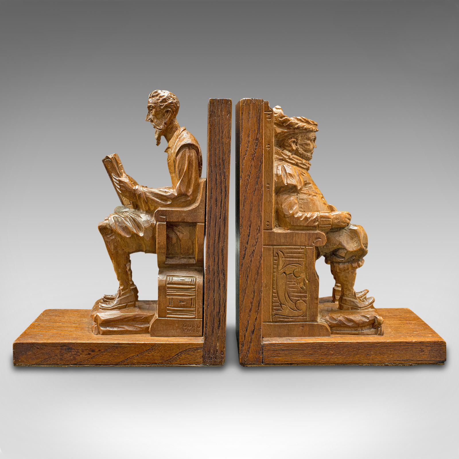 This is a pair of vintage character bookends. A Spanish, hand-carved oak figurative book rest of Don Quixote and Sancho Panza, dating to the mid 20th century, circa 1960.

Fascinating hand-carved bookends of the literary icons
Displays a desirable