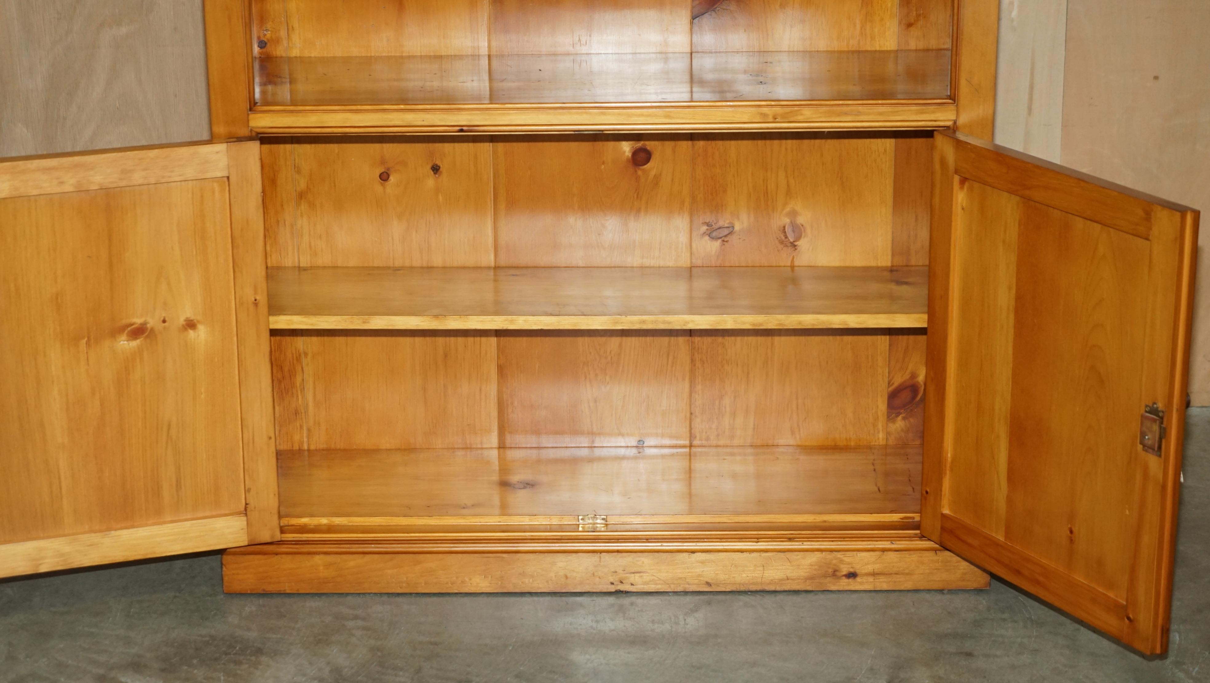 PAIR OF ViNTAGE CHERRYWOOD OPEN LIBRARY BOOKCASES WITH LOCKABLE CUPBOARD BASES For Sale 4