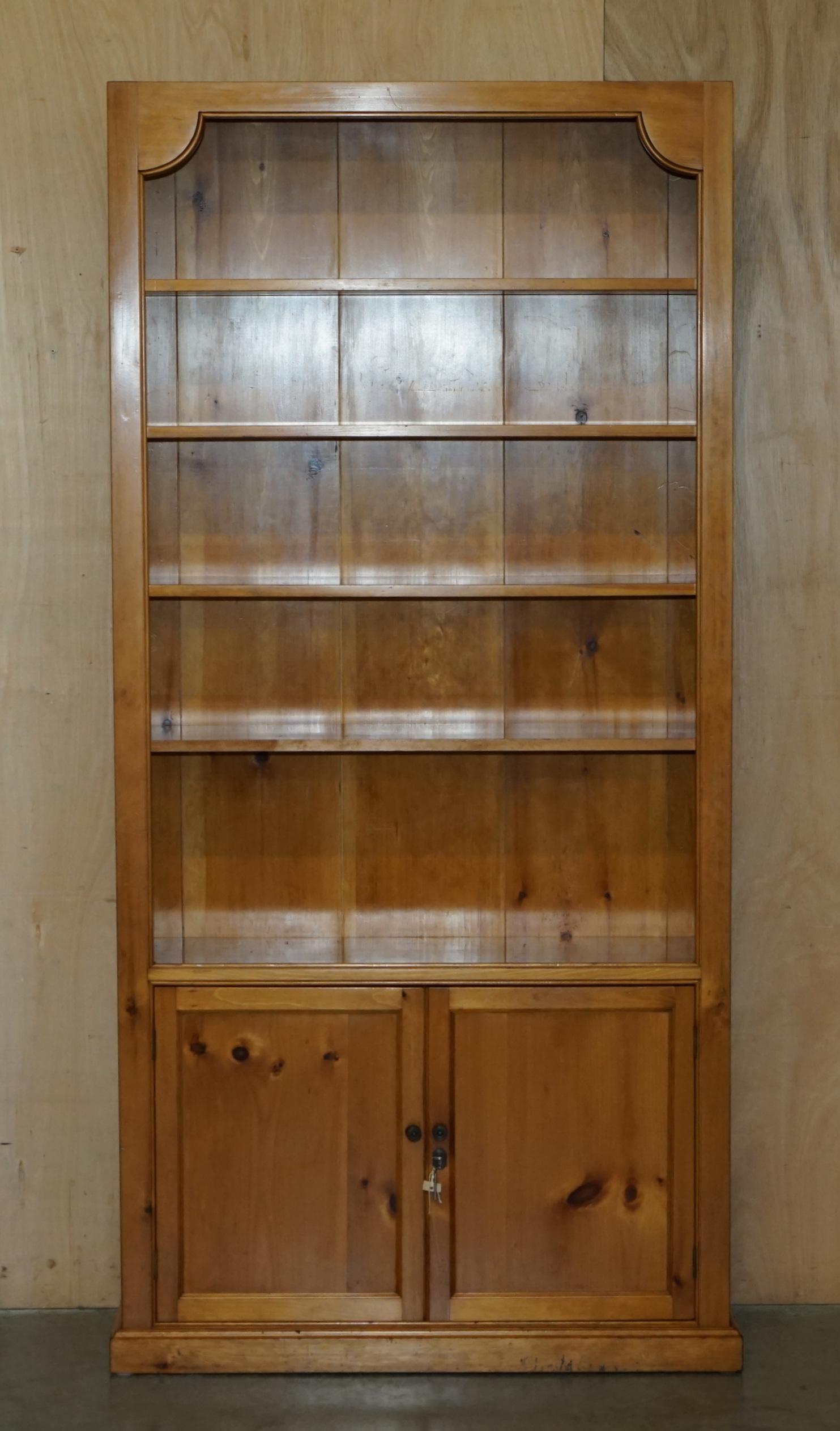 PAIR OF ViNTAGE CHERRYWOOD OPEN LIBRARY BOOKCASES WITH LOCKABLE CUPBOARD BASES For Sale 7