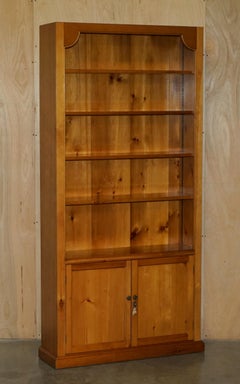 PAIR OF ViNTAGE CHERRYWOOD OPEN LIBRARY BOOKCASES WITH LOCKABLE CUPBOARD BASES