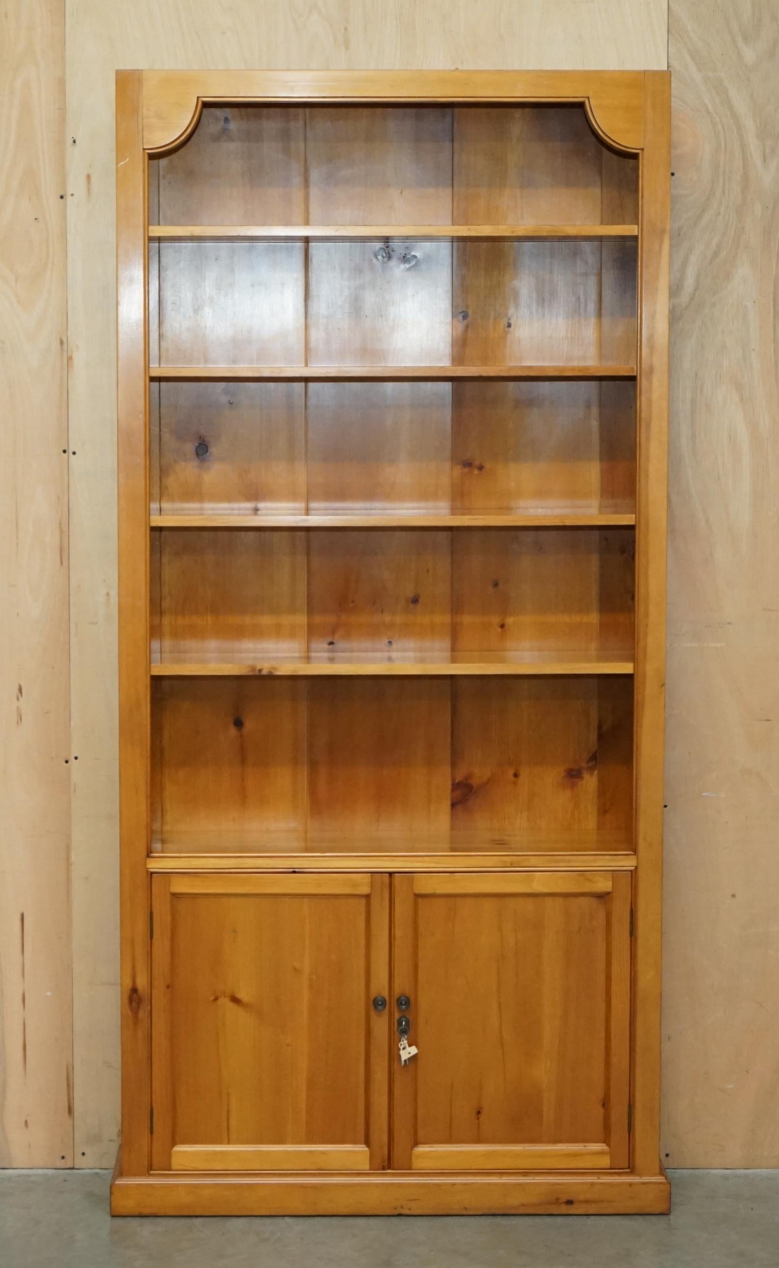 Country PAIR OF ViNTAGE CHERRYWOOD OPEN LIBRARY BOOKCASES WITH LOCKABLE CUPBOARD BASES For Sale