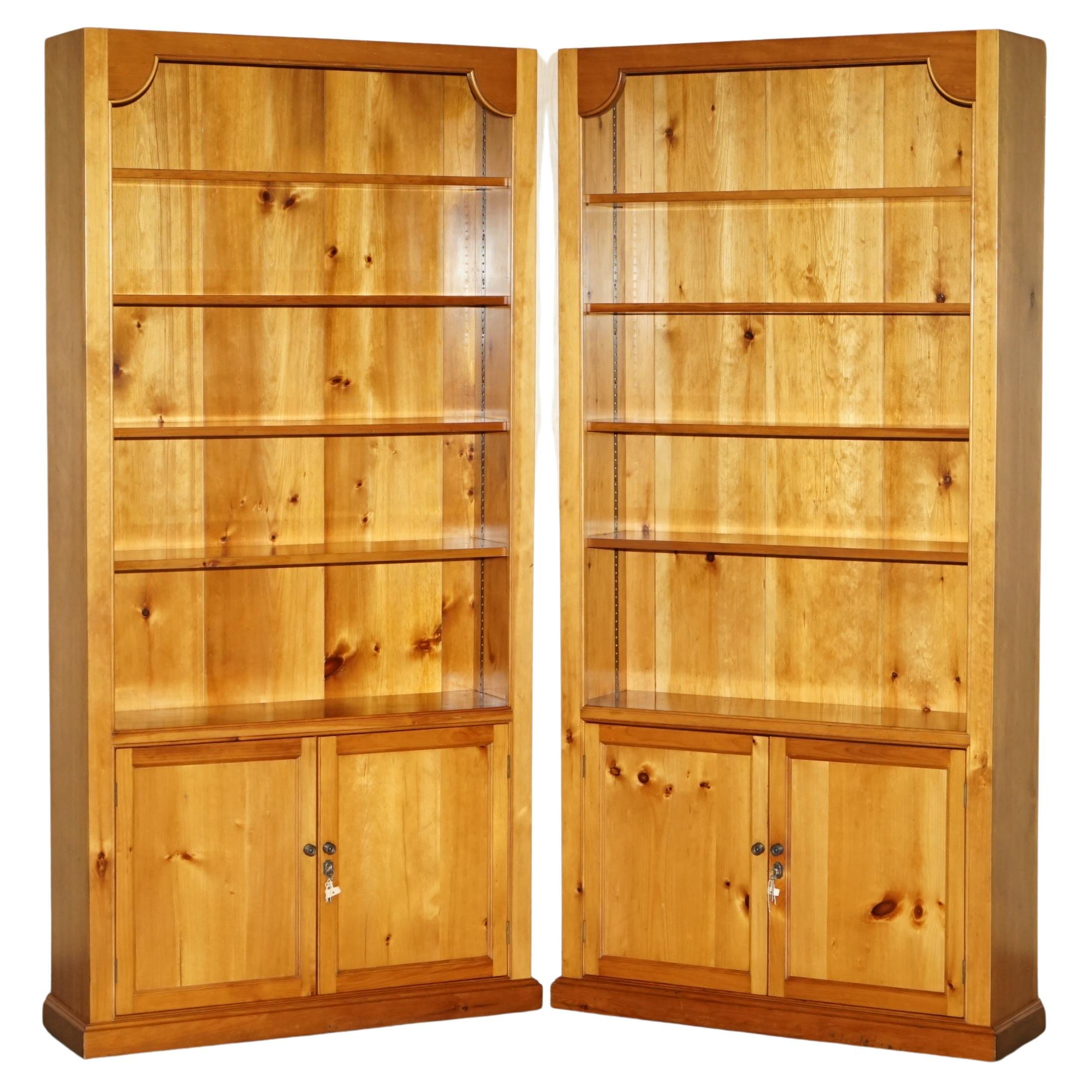 PAIR OF ViNTAGE CHERRYWOOD OPEN LIBRARY BOOKCASES WITH LOCKABLE CUPBOARD BASES For Sale