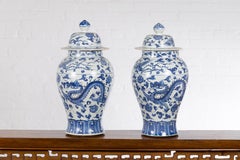 Pair of Vintage Chinese Blue and white Porcelain Lidded Jars with Dragon Motifs