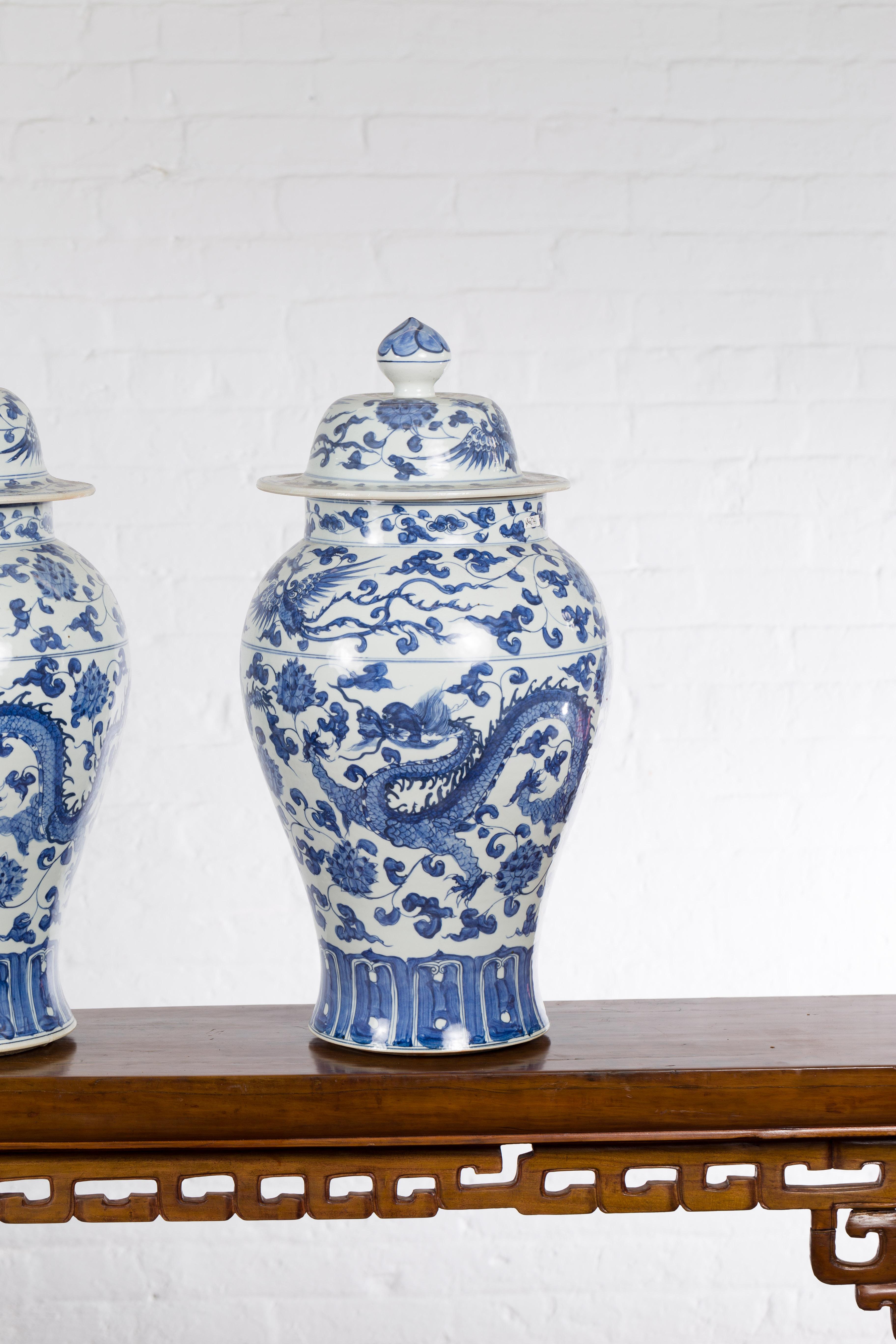 20th Century Pair of Vintage Chinese Blue and white Porcelain Lidded Jars with Dragon Motifs