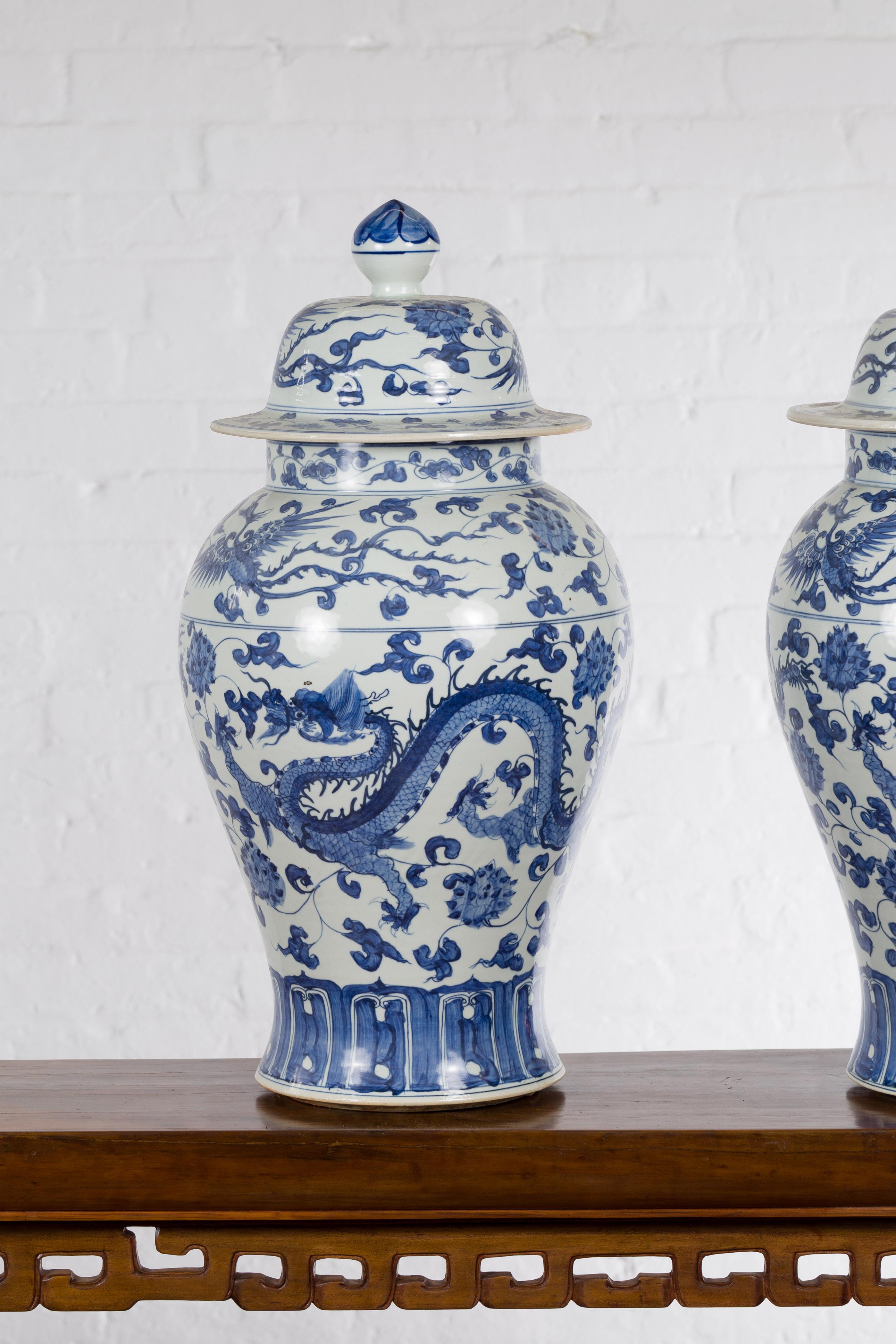 Pair of Vintage Chinese Blue and white Porcelain Lidded Jars with Dragon Motifs 2