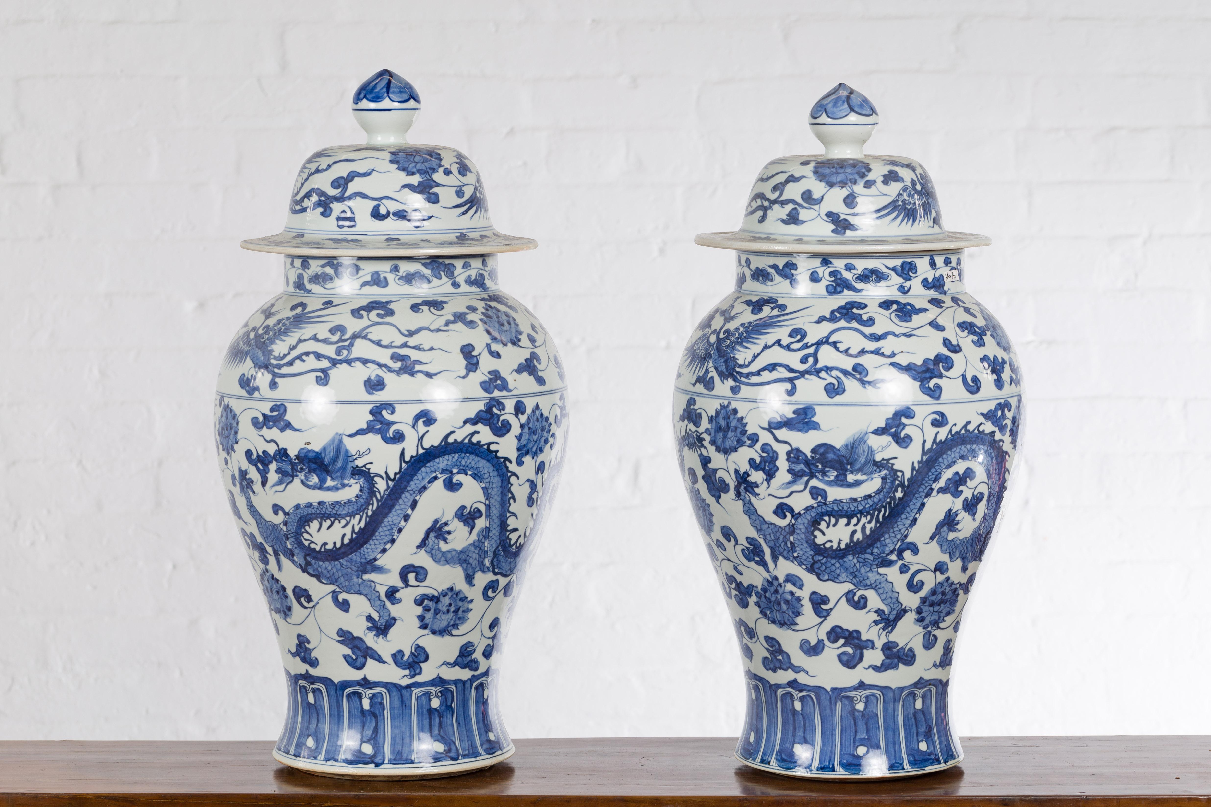 Pair of Vintage Chinese Blue and white Porcelain Lidded Jars with Dragon Motifs 4