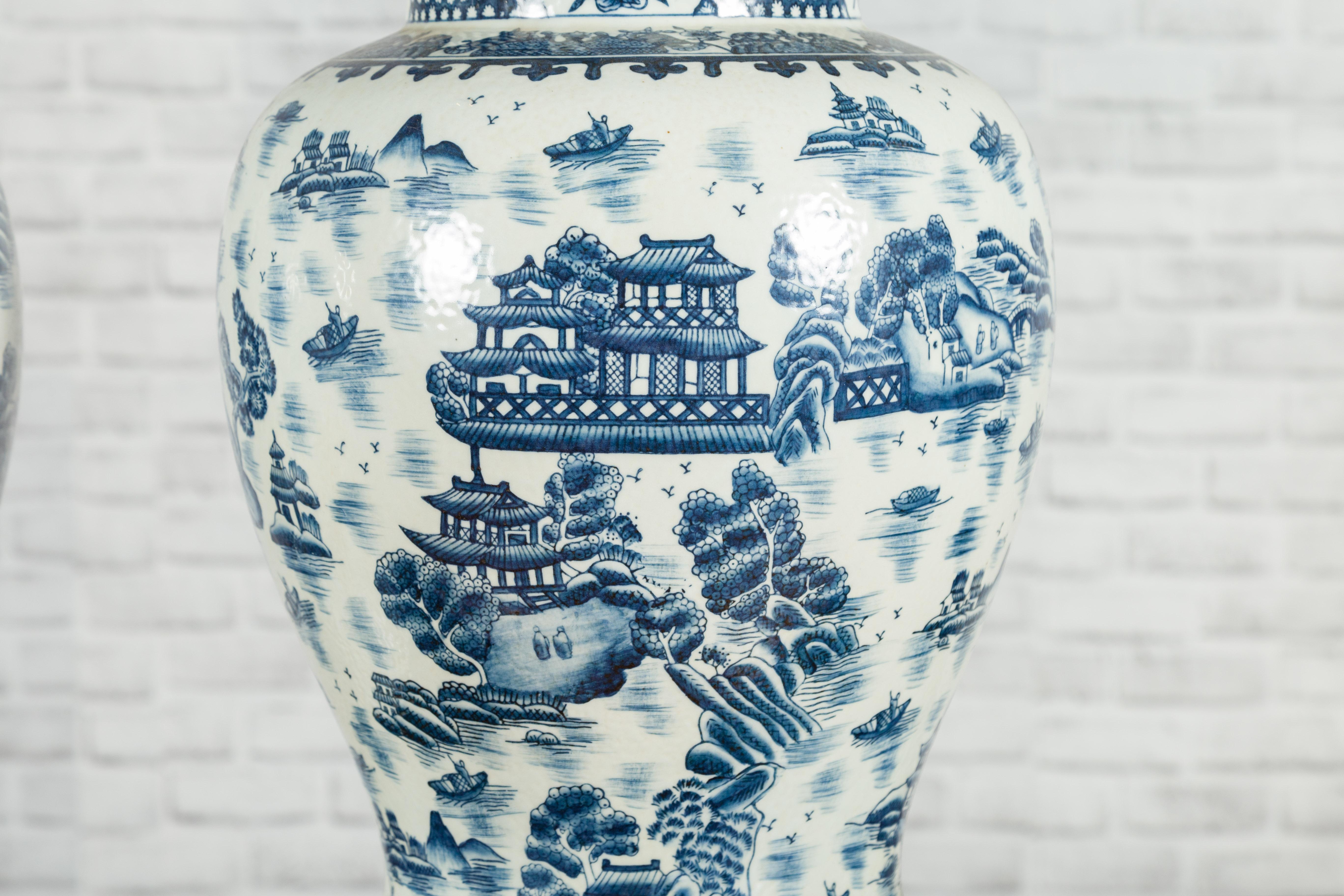 Pair of Vintage Chinese Blue and white Porcelain Temple Jars with Architectures 7