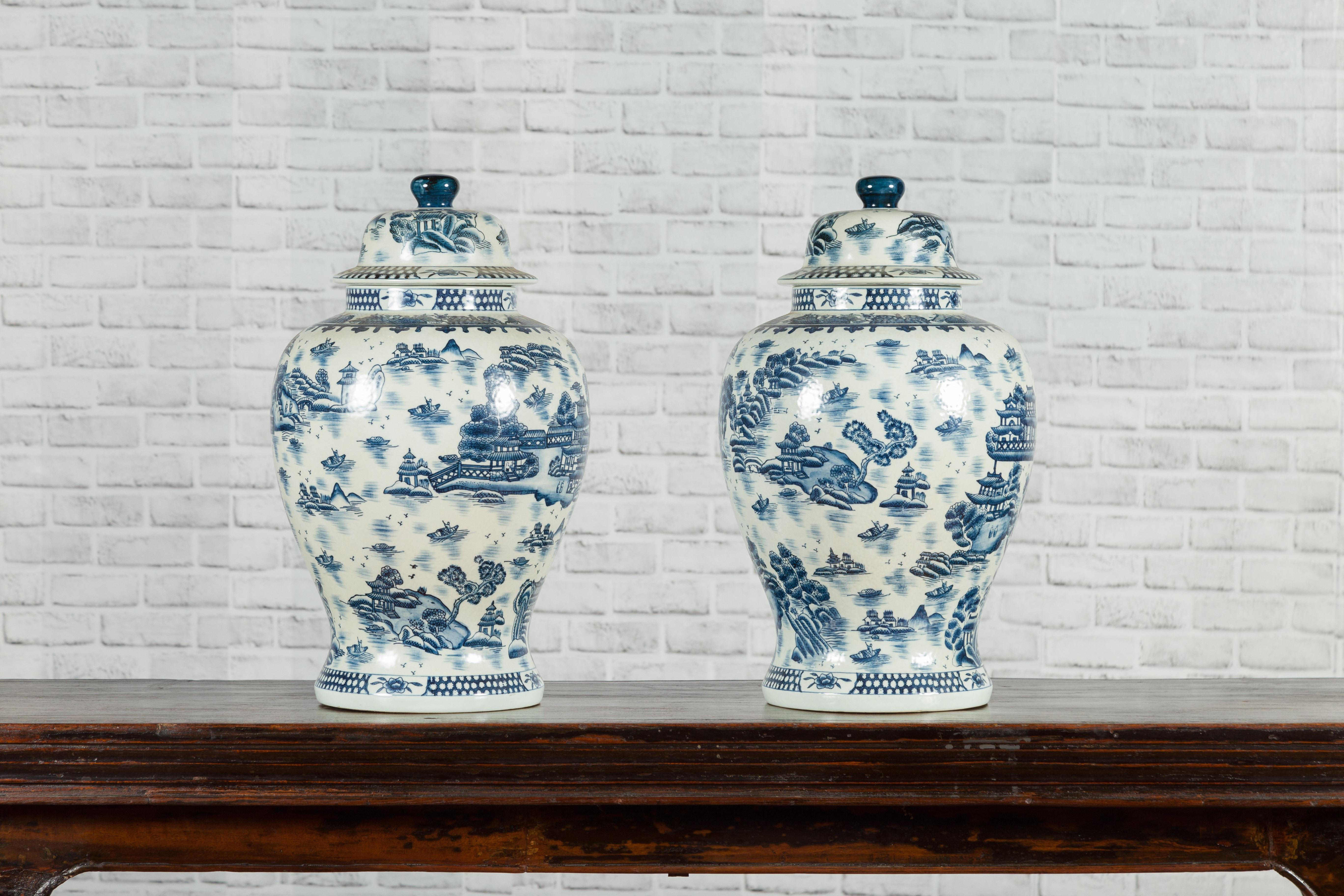 Pair of Vintage Chinese Blue and white Porcelain Temple Jars with Architectures 9